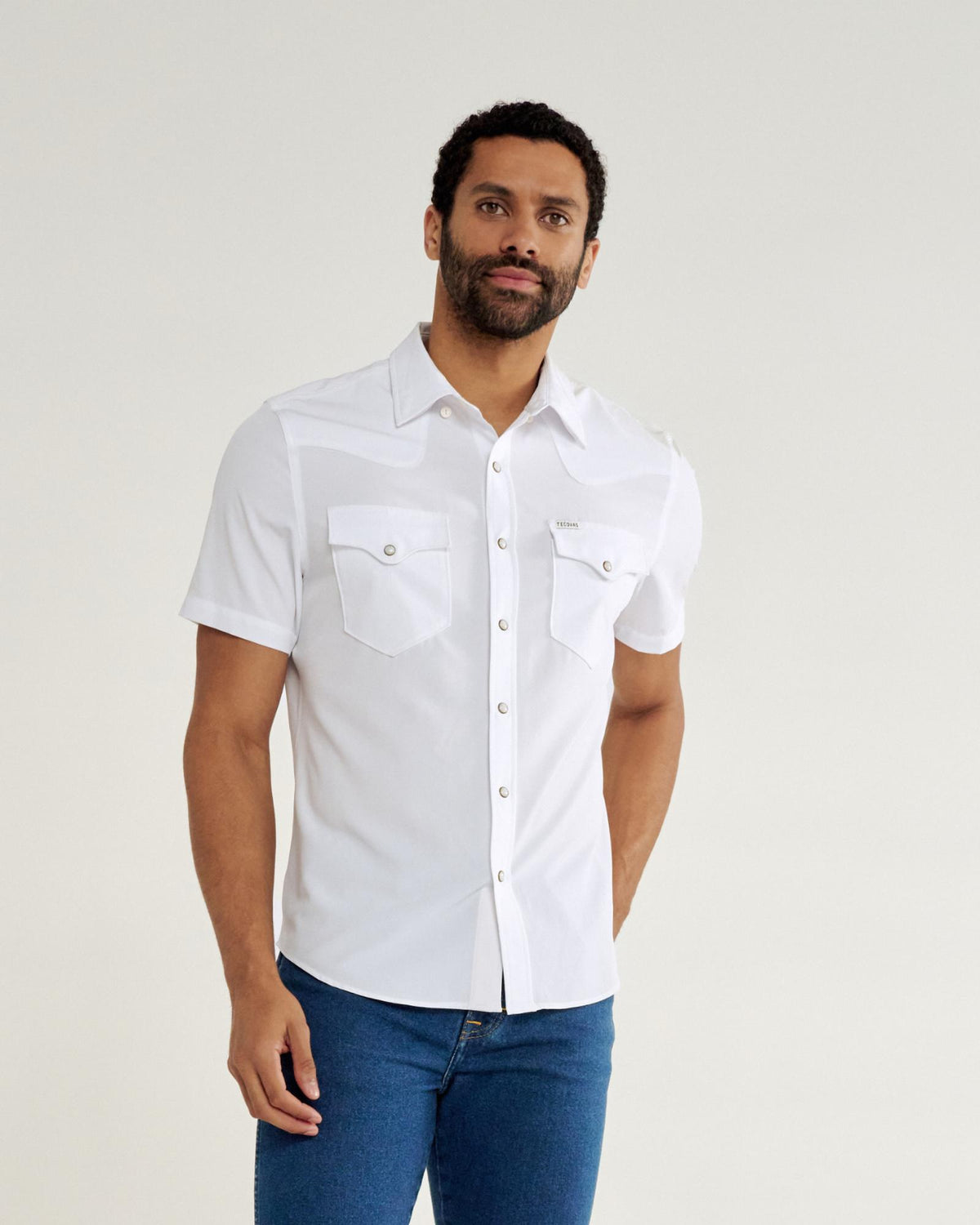 Closeup detail view of Men's Performance Western Pearl Snap SS - White