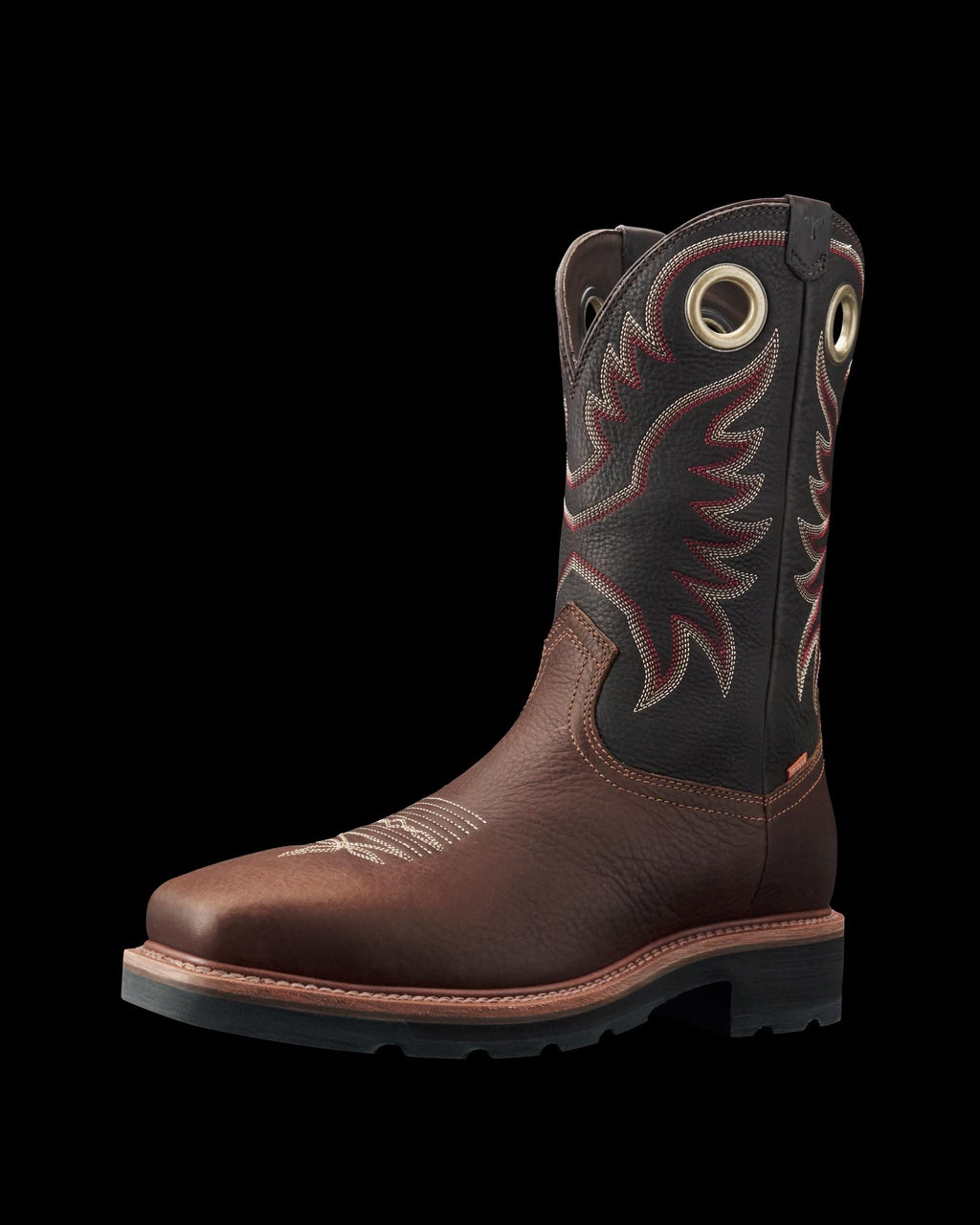 LongHaul Waterproof Square Composite Toe Work Boot in Tobacco / Black Cowhide. Brown leather cowboy boot in Tobacco / Black cowhide with a black upper, red and white stitching, round pull holes, and a rubber sole, shown against a plain black background.