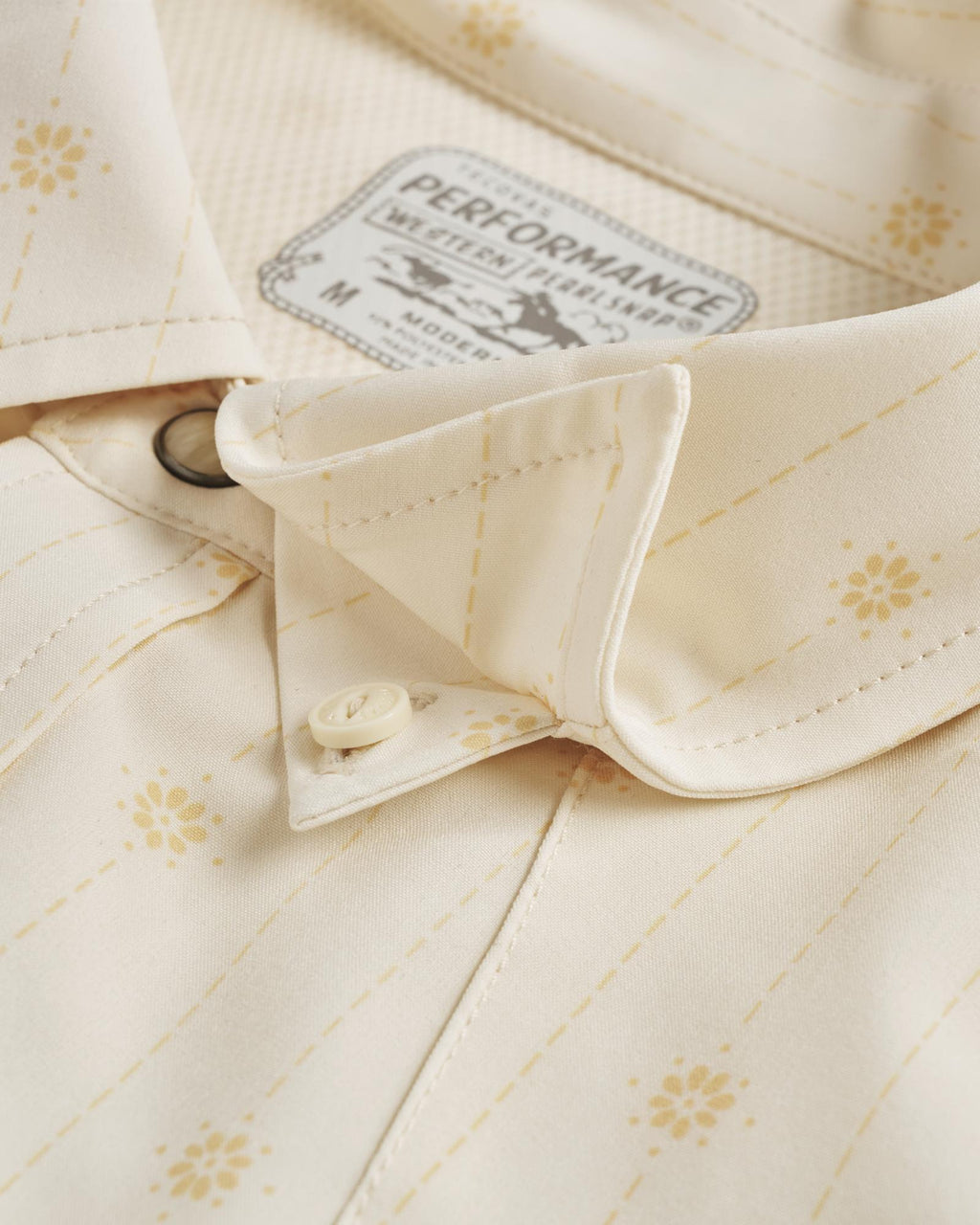 Closeup detail view of Men's Performance Western Short Sleeve Pearl Snap - Light Sand/Multi