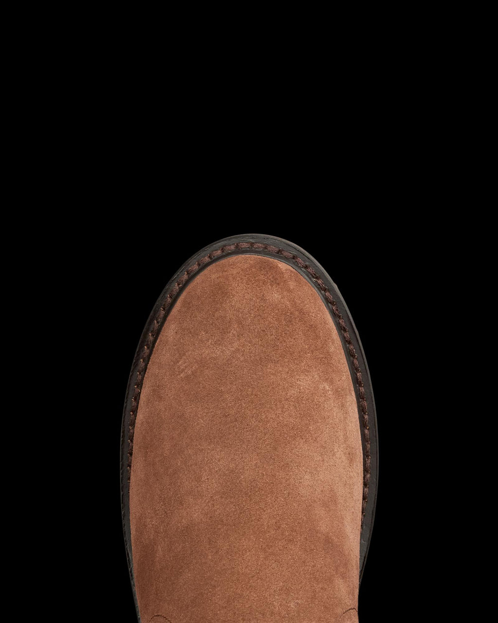 Toe view of The Chelsea Shearling - Bourbon Suede on plain background