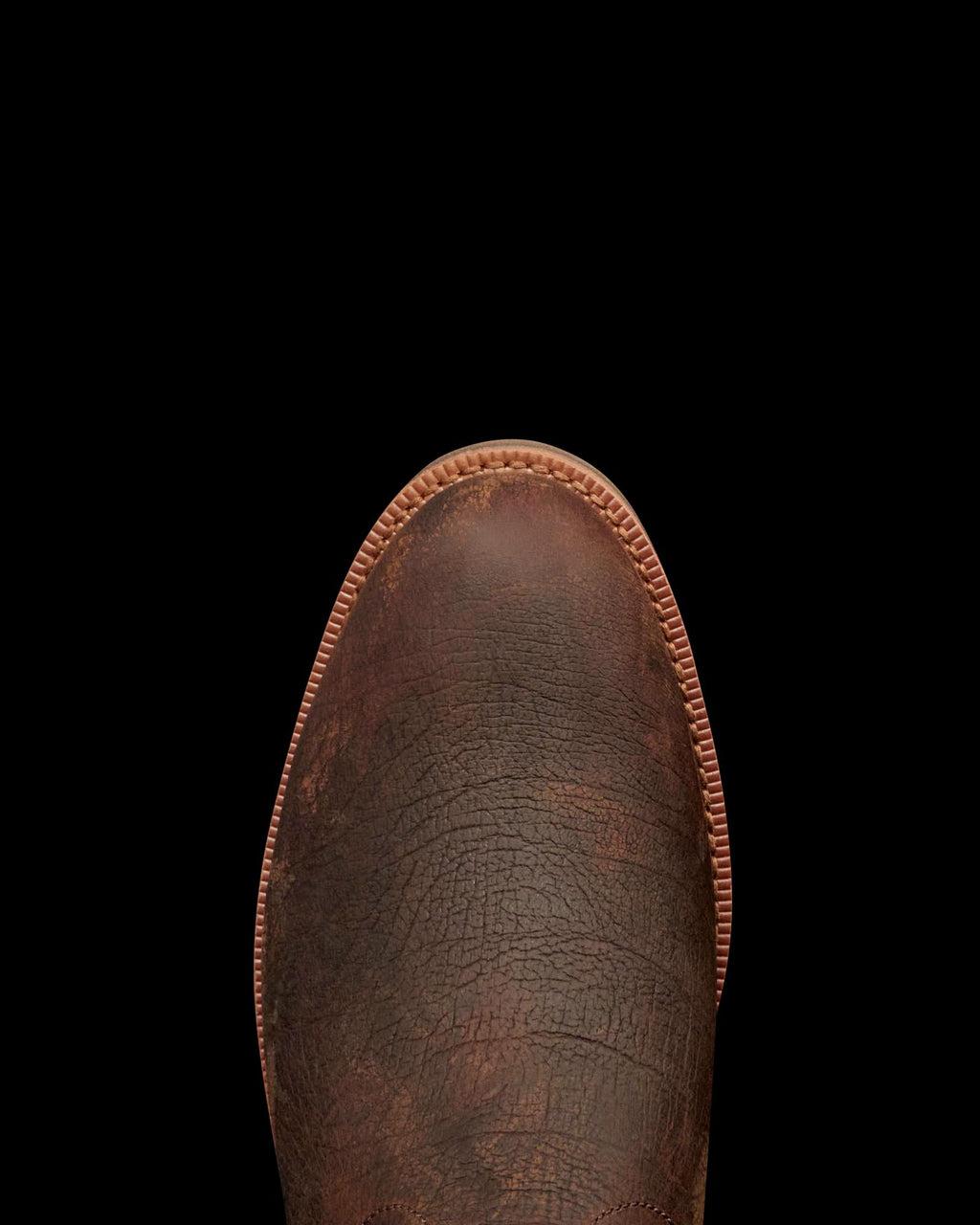 Toe view of Tecovas x Mossy Oak Rugged Roper - Full Foliage Cowhide on plain background