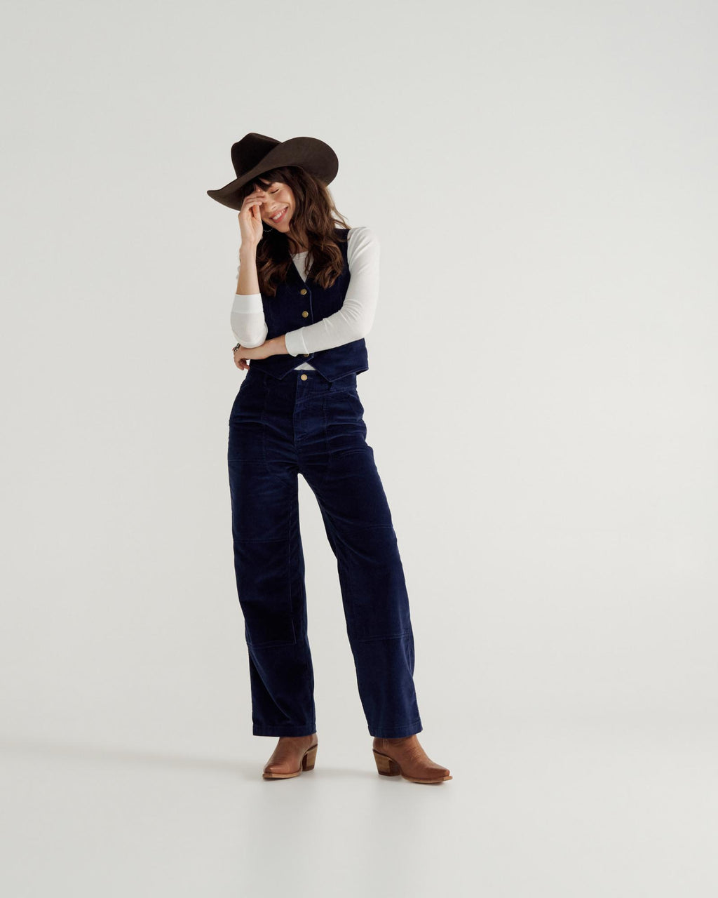 Full view of Women's Corduroy Carpenter Pant - Navy on model