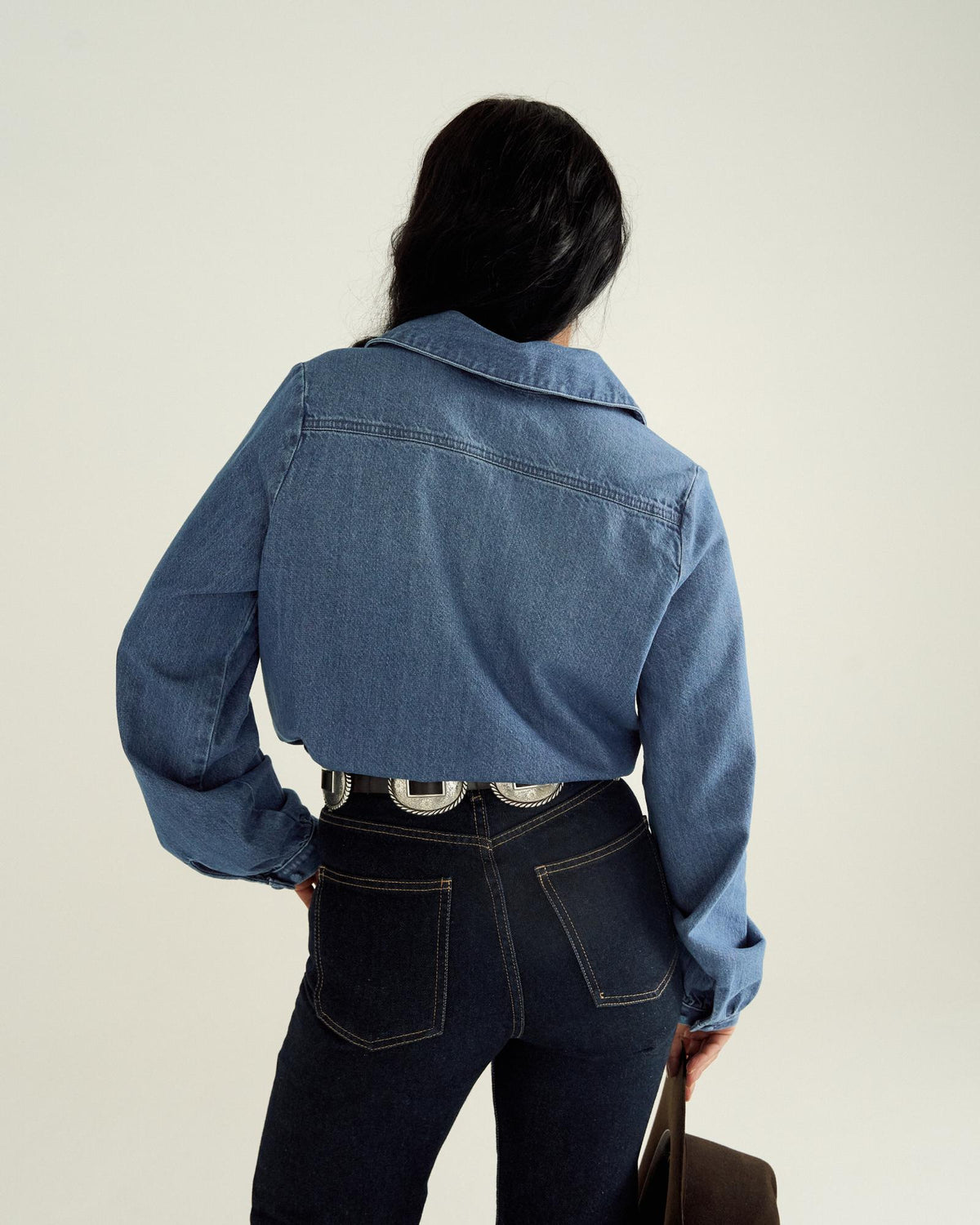 Back view of Women's L/S Denim Popover Top - Medium Wash on model