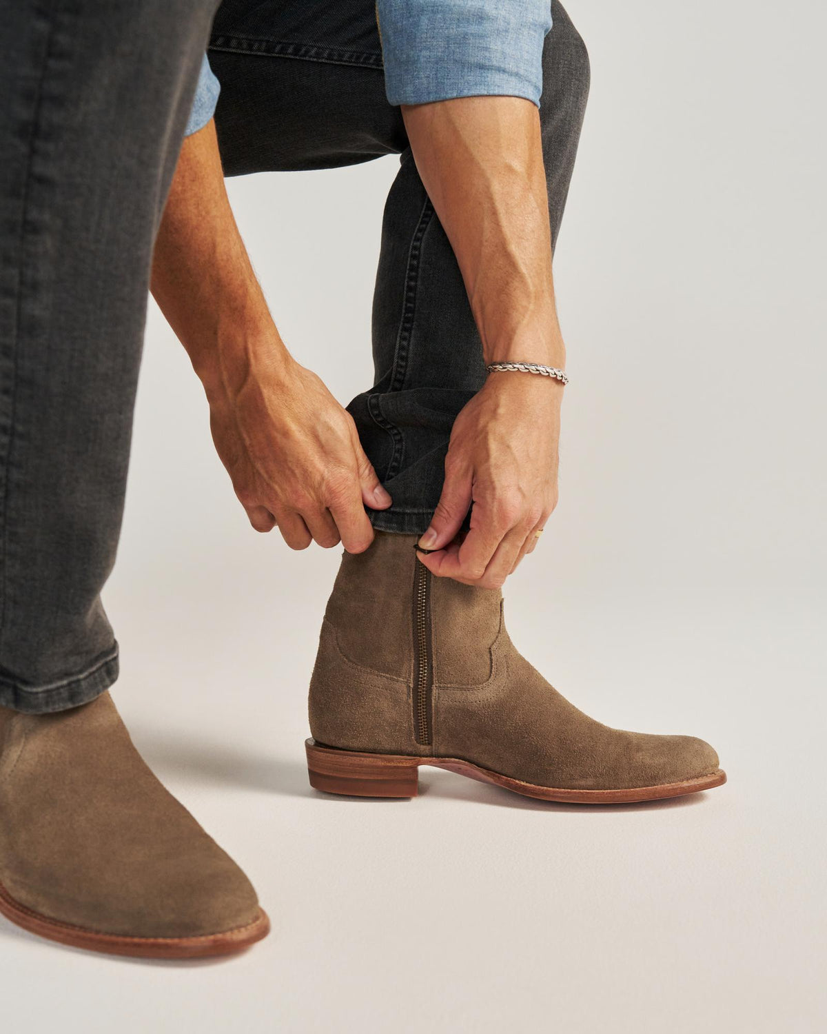 close up of Dean Granite Grey Suede cowboy boots on a man's feet 