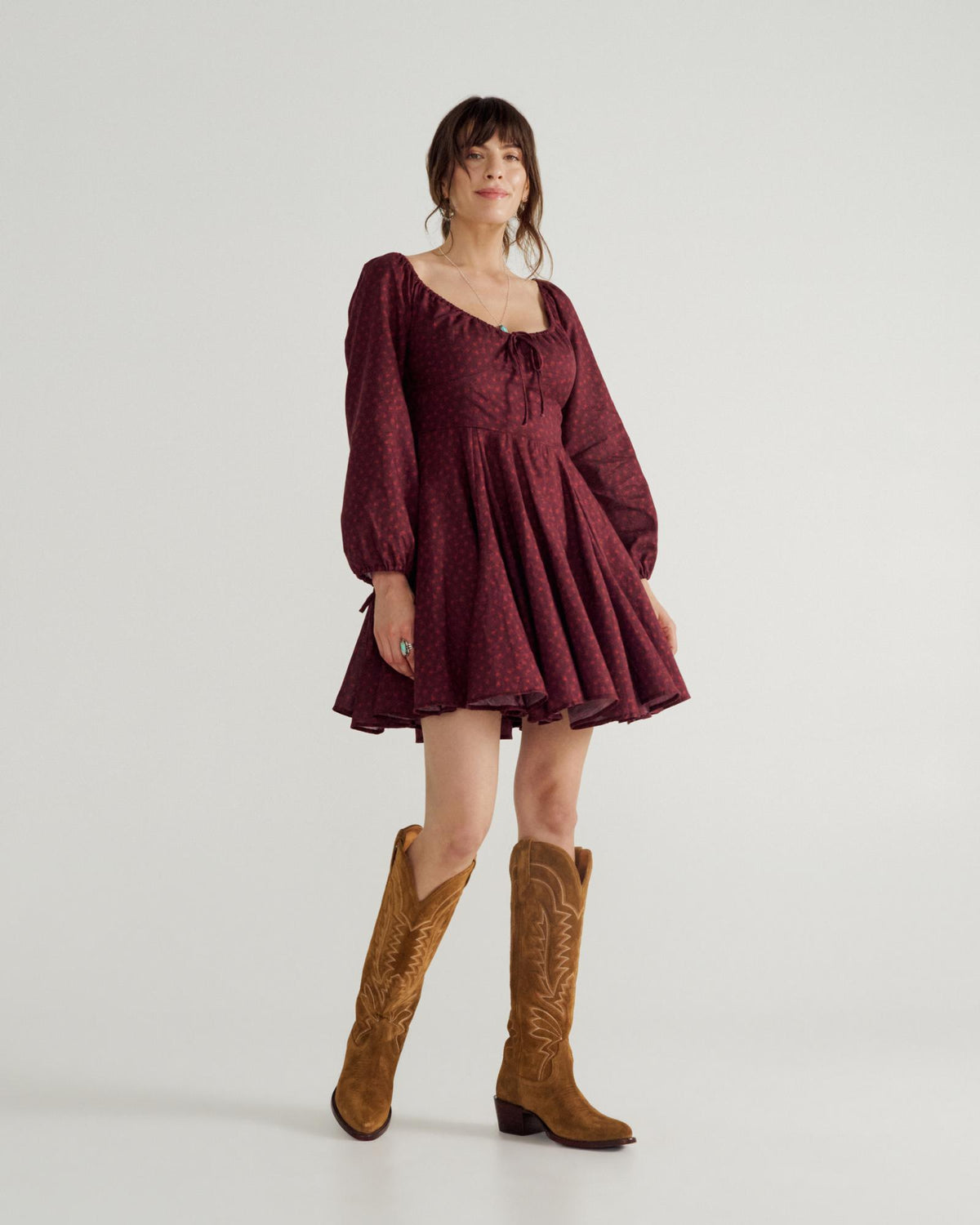 Full view of Women's L/S Mini Dress - Burgundy Floral on model