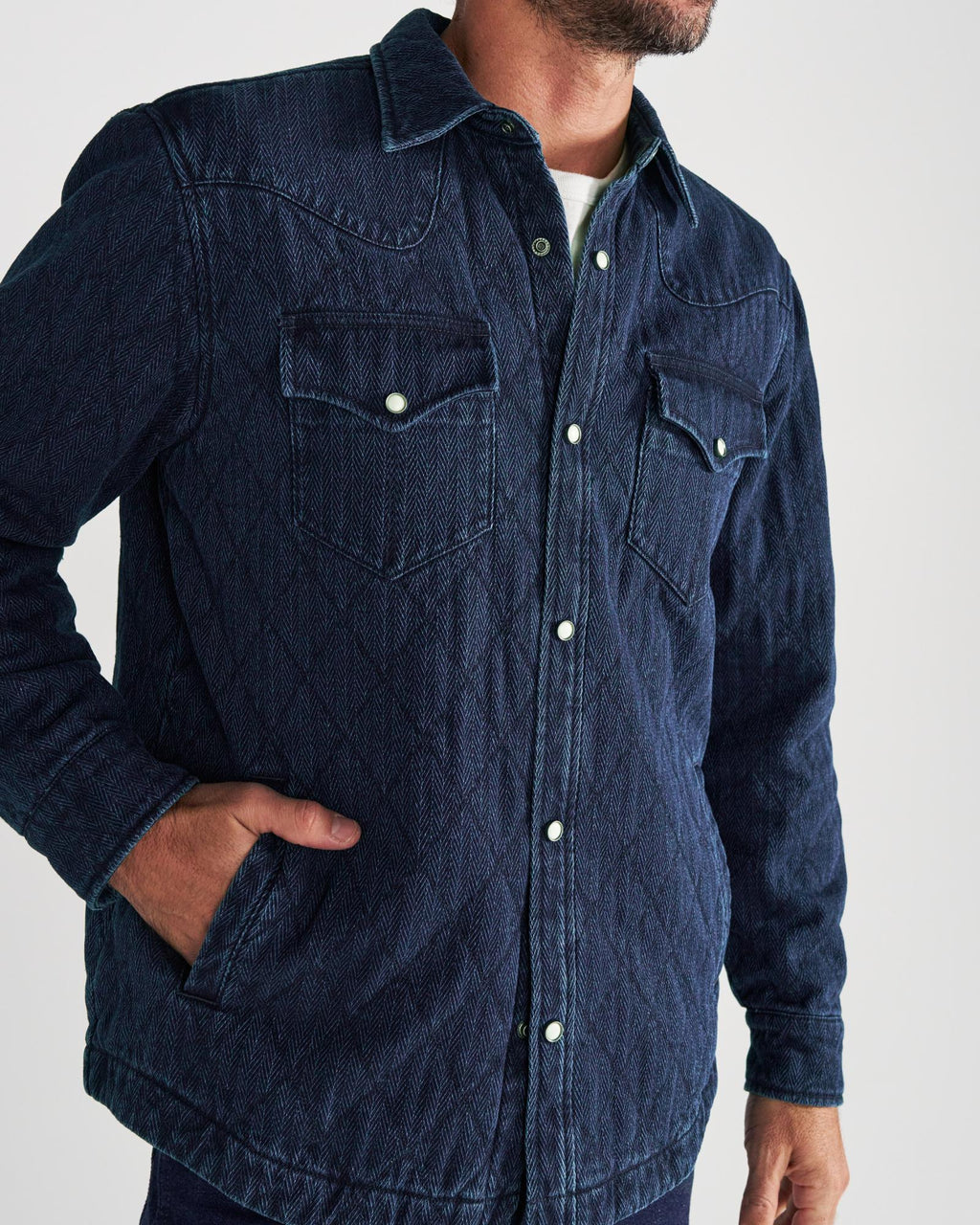 Front view of Men's Quilted Herringbone Shacket - Indigo on model