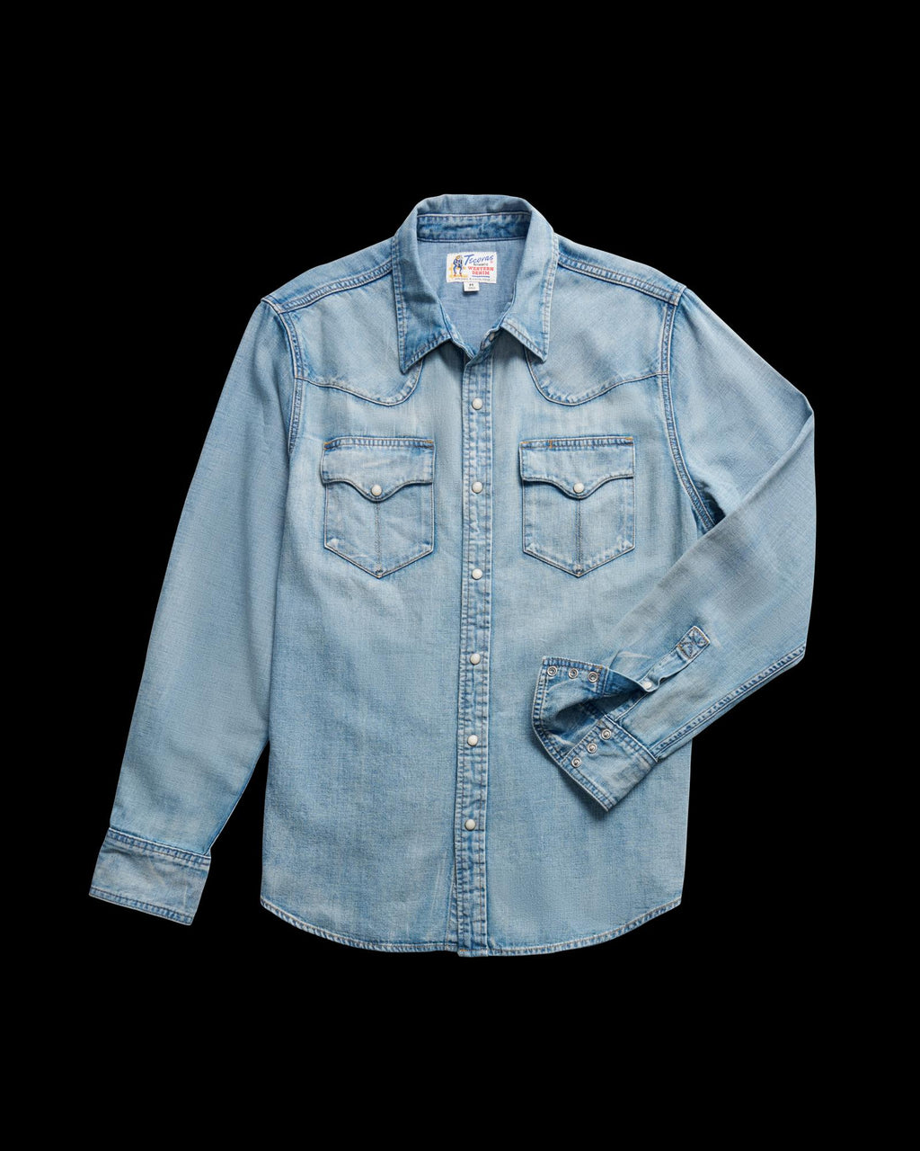 Closeup detail view of Men's Denim Pearl Snap LS - Light Wash