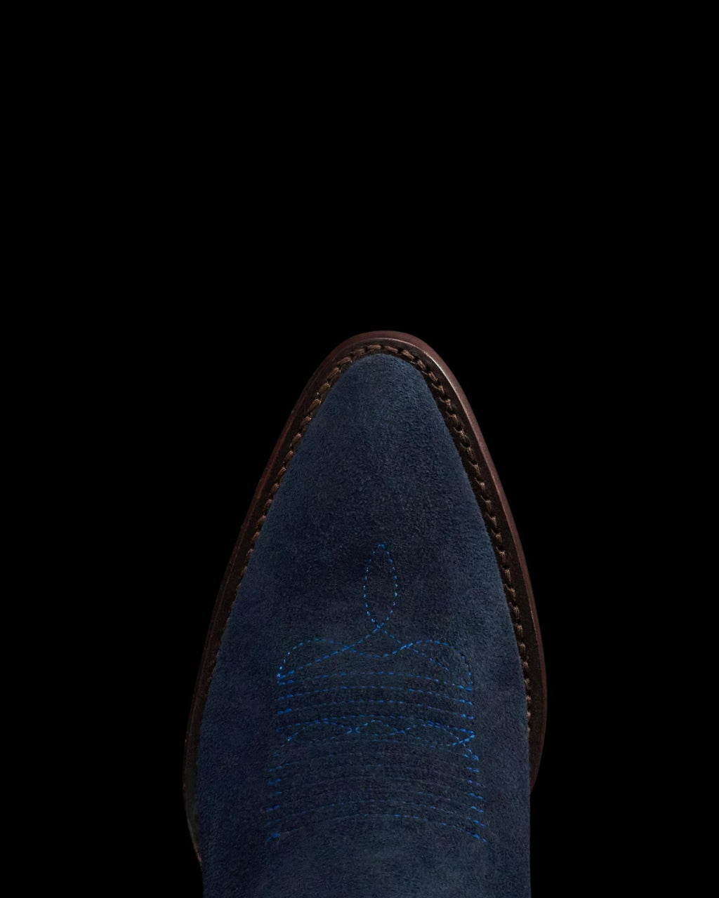 Toe view of The Abby Cavalier - Eclipse Suede on plain background