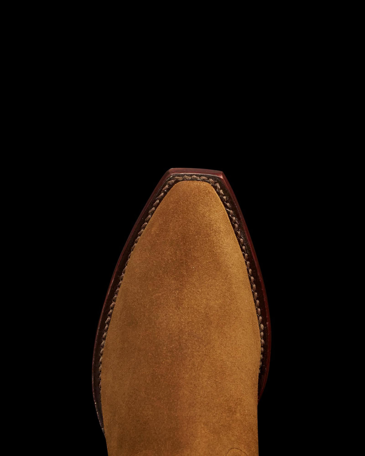 Toe view of The Piper II - Sienna Suede on plain background