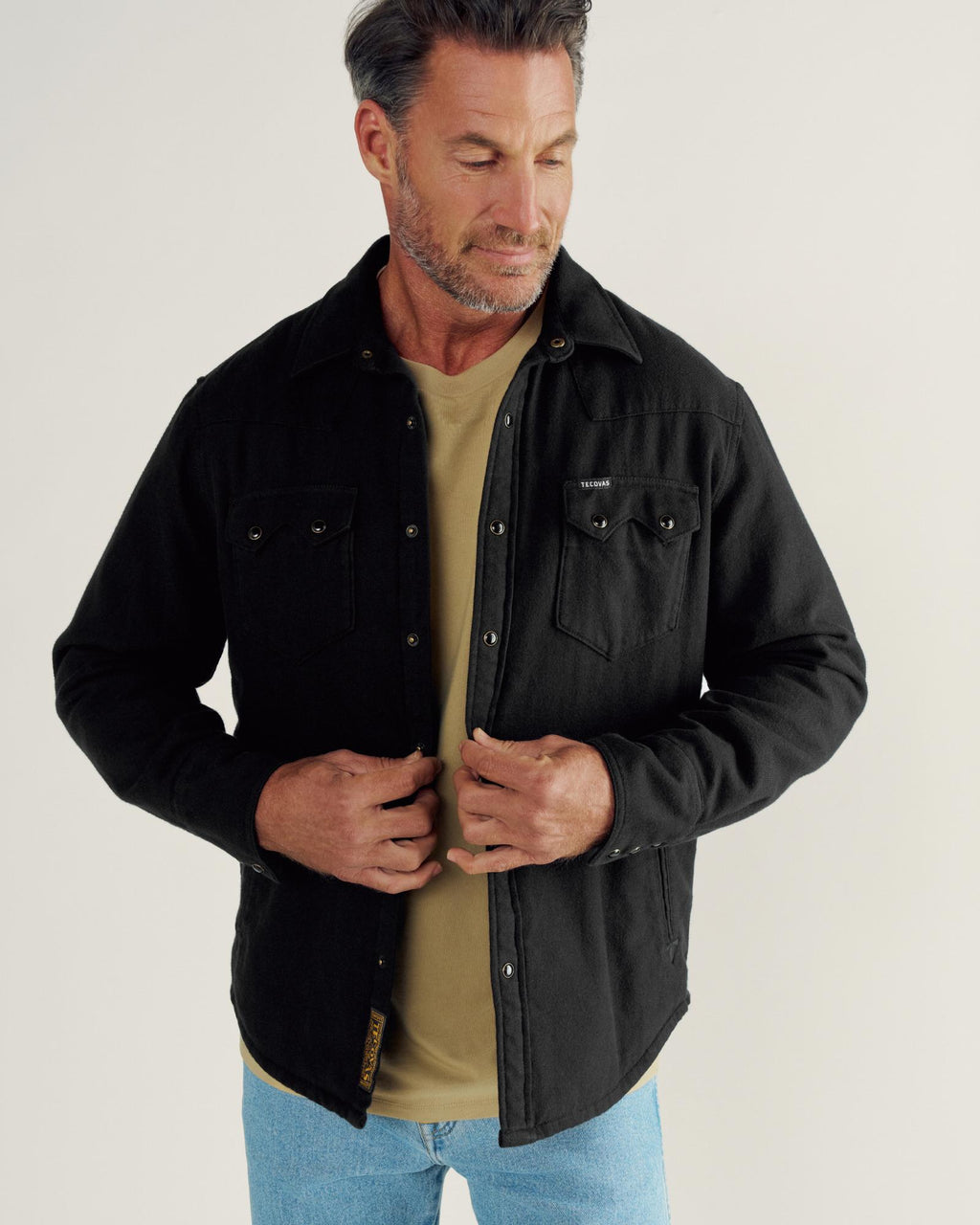 Closeup detail view of Men's Sawtooth Pearl Snap Shacket - Black