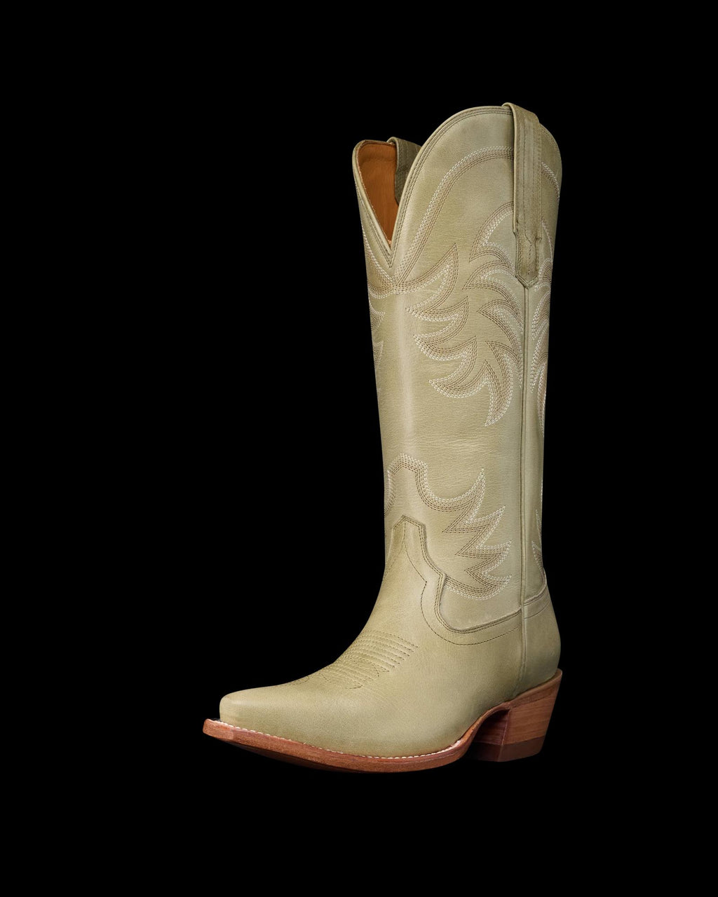Quarterfront view of The Annie - Light Sage Cowhide on plain background