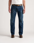 Front view of Men's Straight Stretch Denim - Medium Dark on model