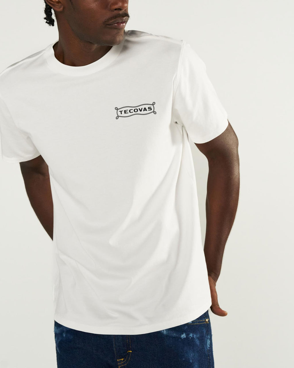 Front view of Men's Boot Expo T-Shirt - Bone on model