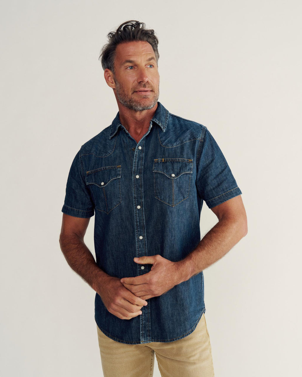 Closeup detail view of Men's Denim Short Sleeve Pearl Snap - Dark Wash