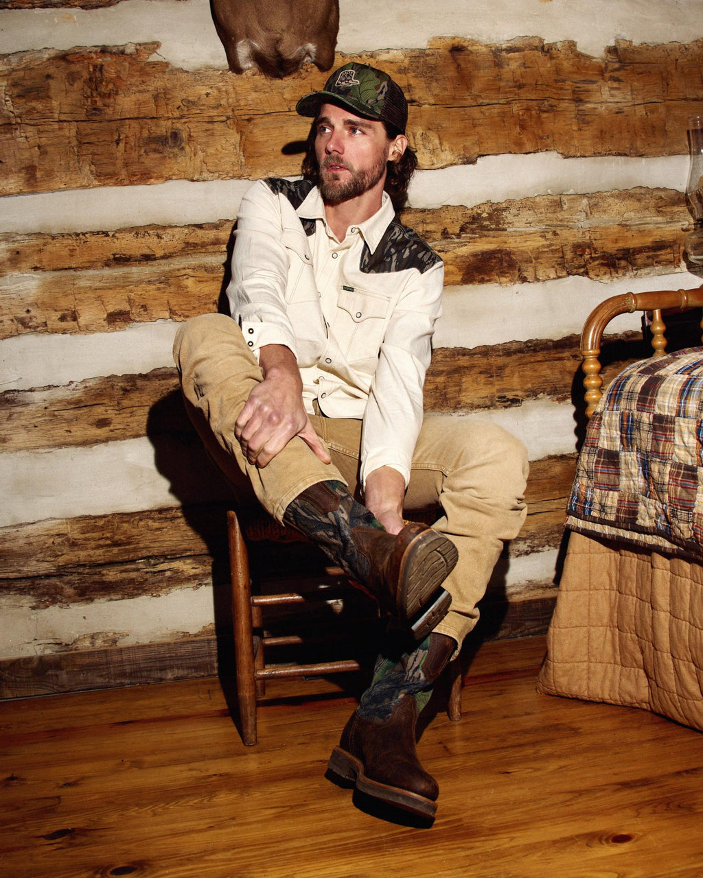 Full view of Tecovas x Mossy Oak Rugged Roper - Full Foliage Cowhide on plain background