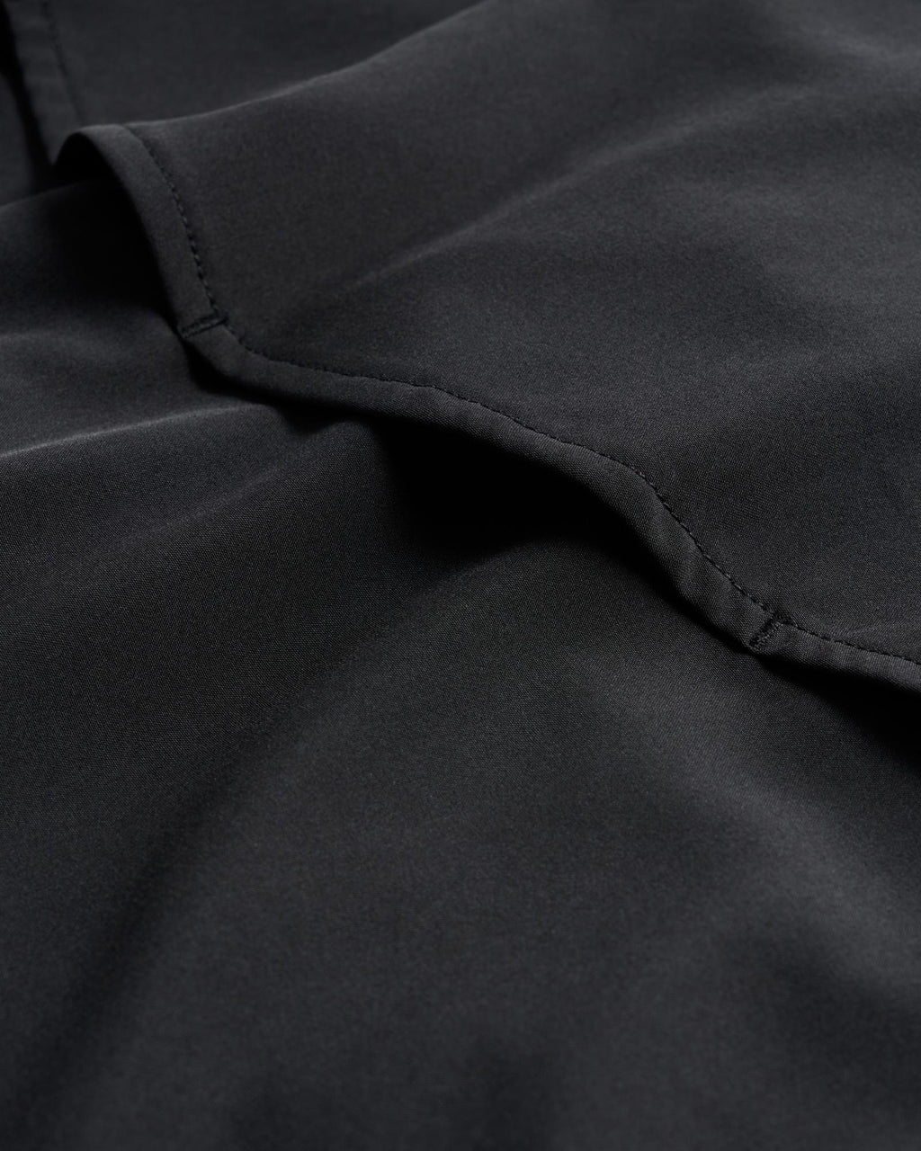 Closeup detail view of Men's Performance Western Pearl Snap SS - Black
