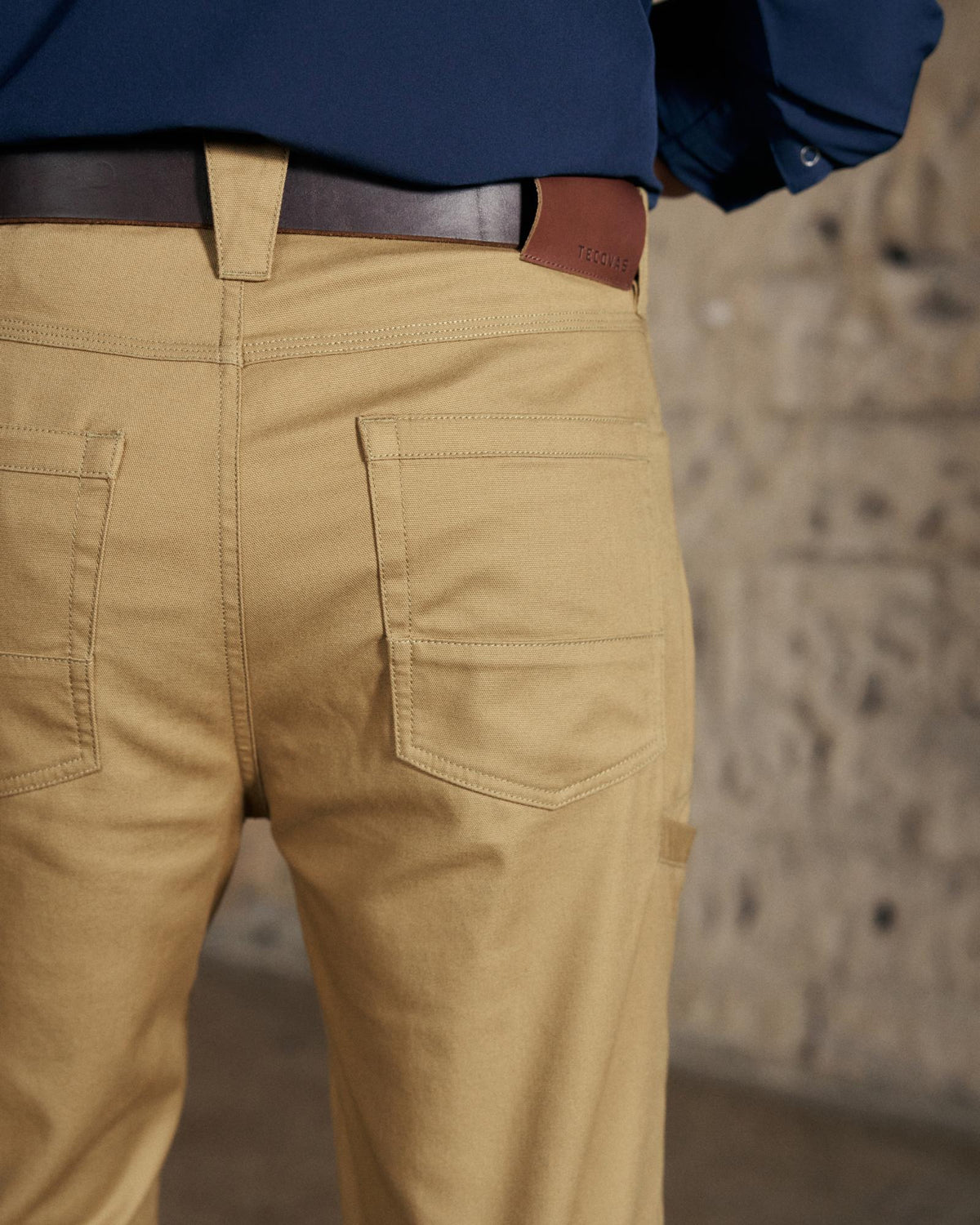 Back view of Men's Work Pant - Desert Tan on model