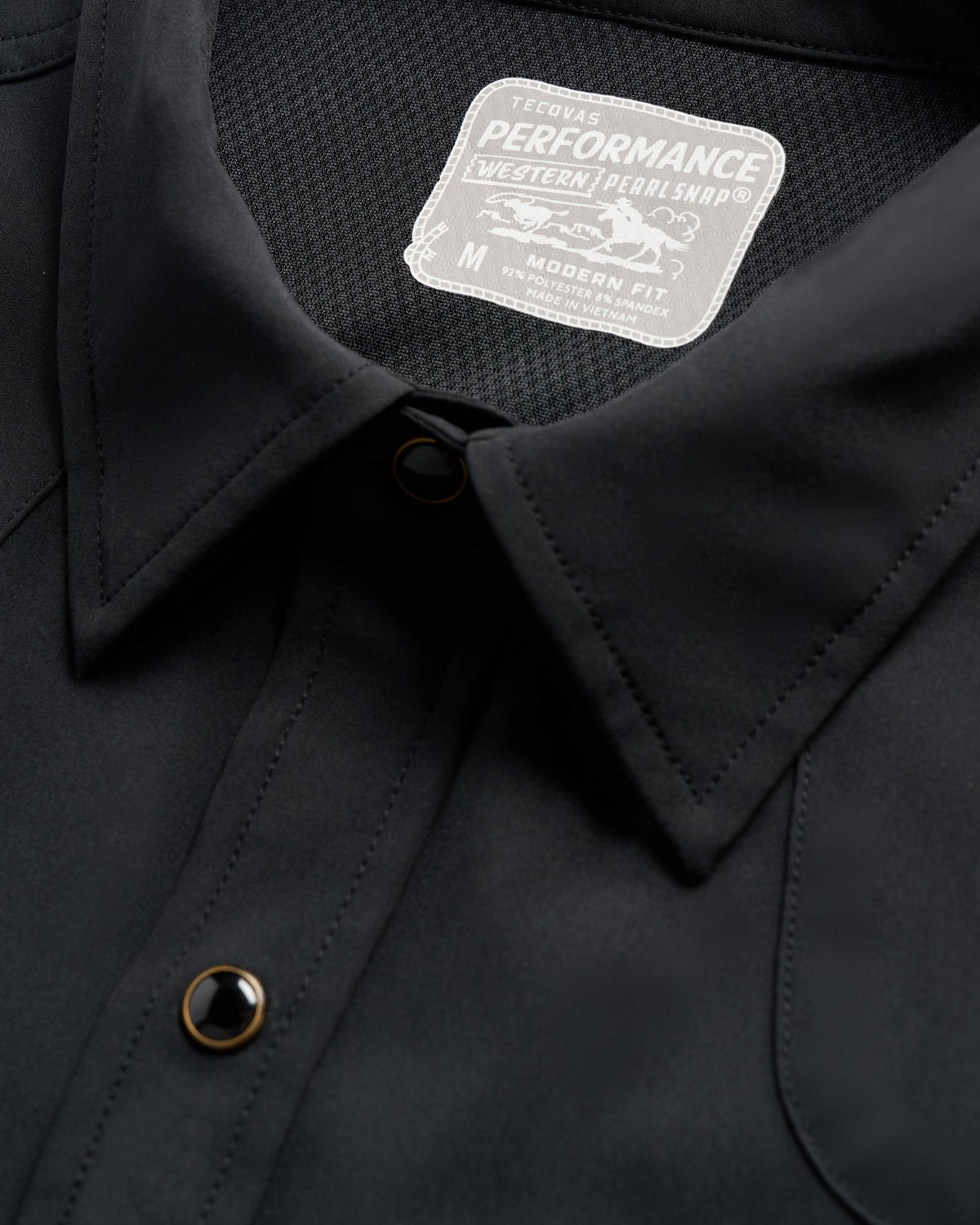 Closeup detail view of Men's Performance Western Pearl Snap LS - Black