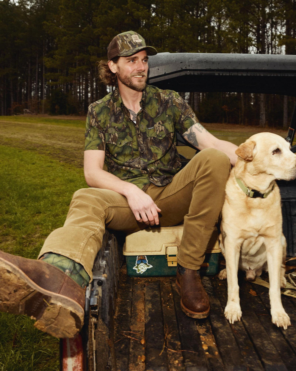 Full view of Tecovas x Mossy Oak Rugged Roper - Full Foliage Cowhide on plain background
