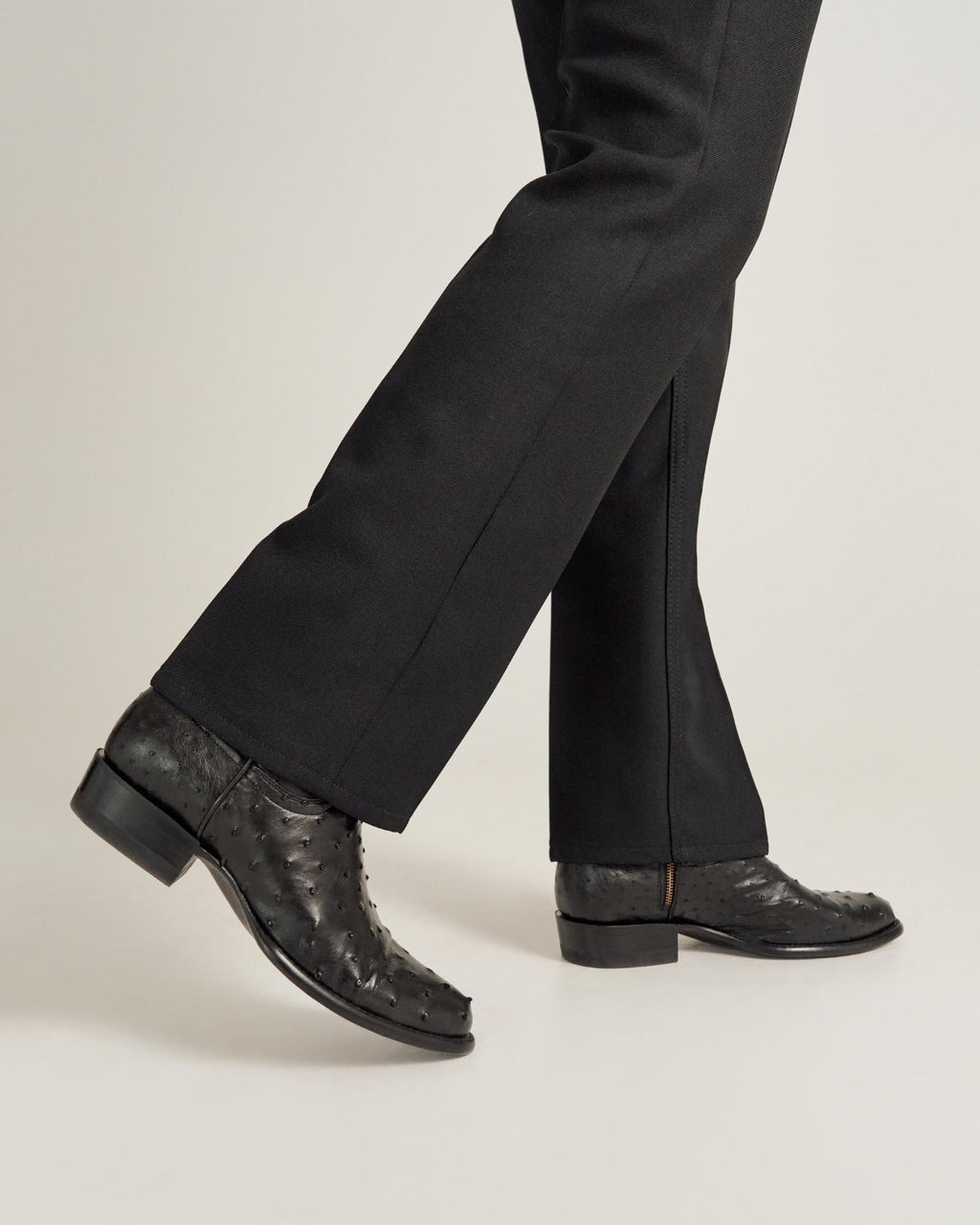 close up of Dean Midnight Black Zip Cowboy Boot on a man's feet 