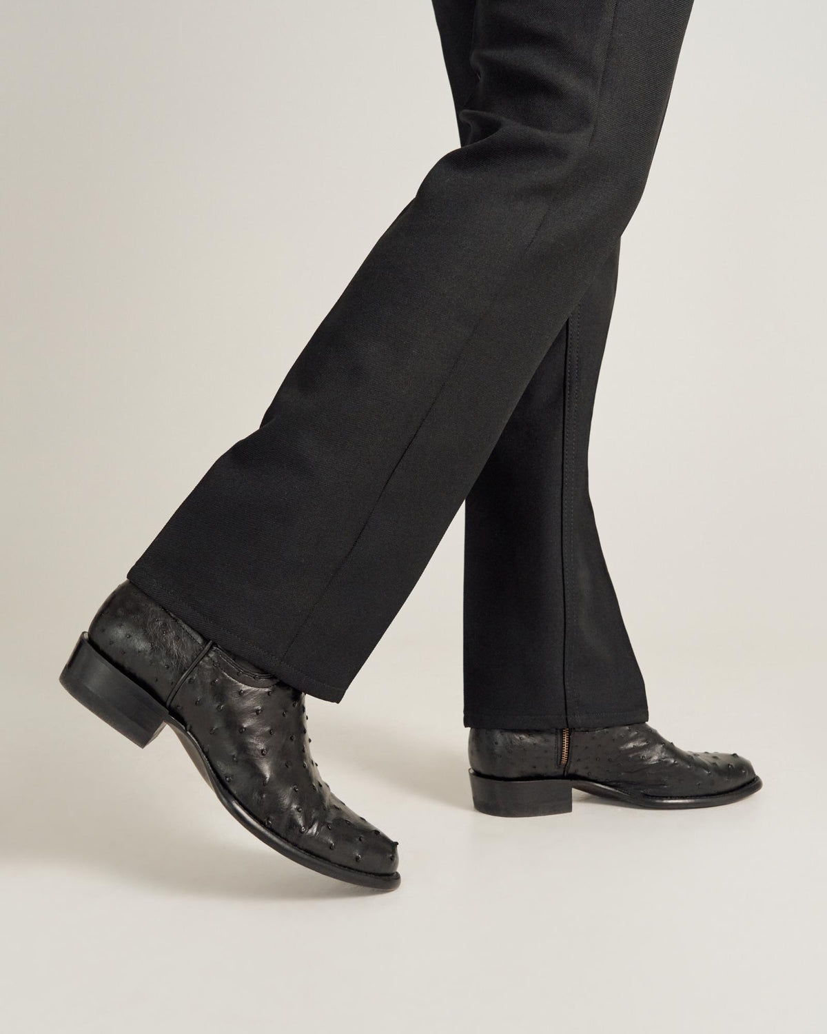 close up of Dean Midnight Black Zip Cowboy Boot on a man's feet 