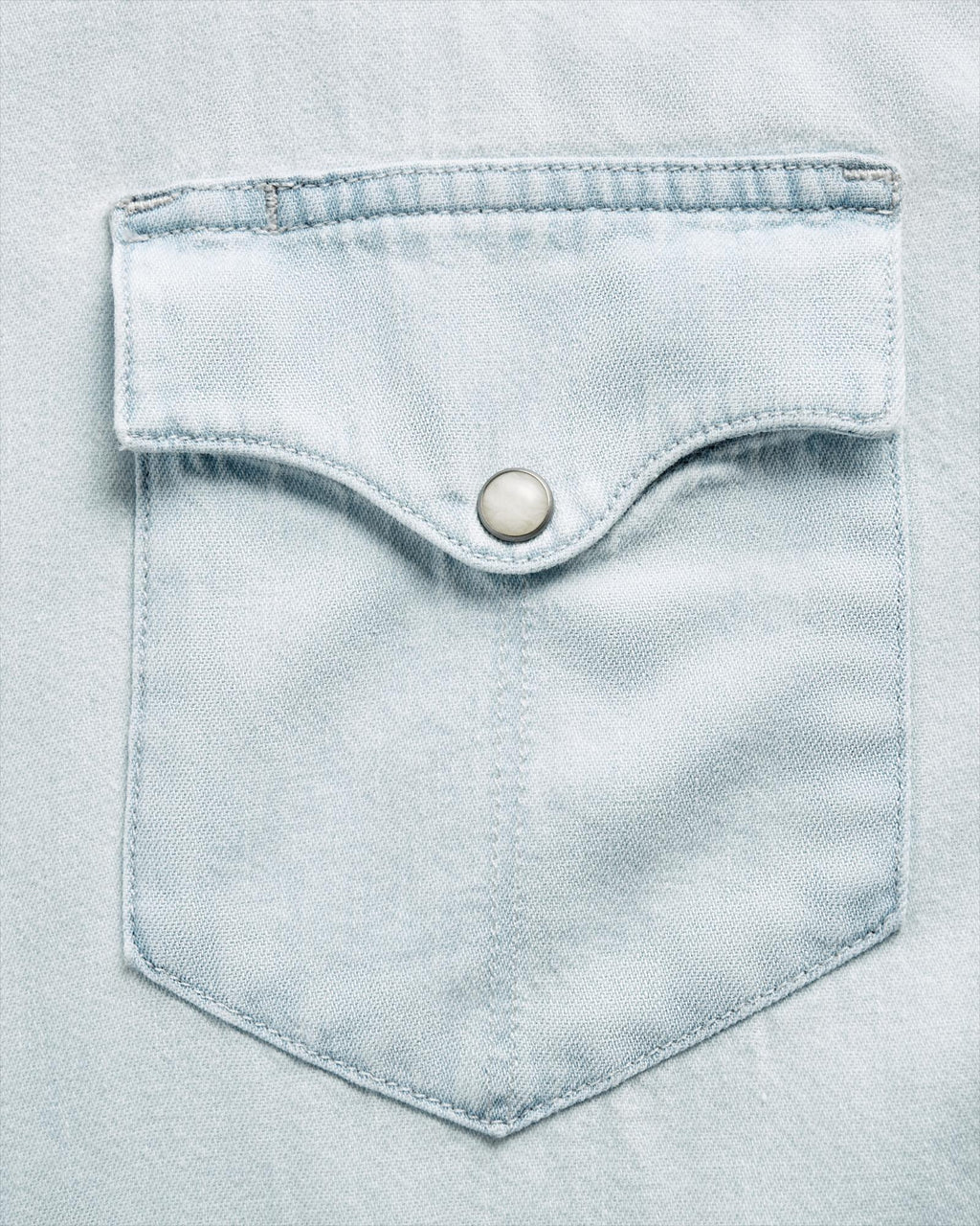 Closeup detail view of Men's Denim Short Sleeve Pearl Snap - Ultra Light
