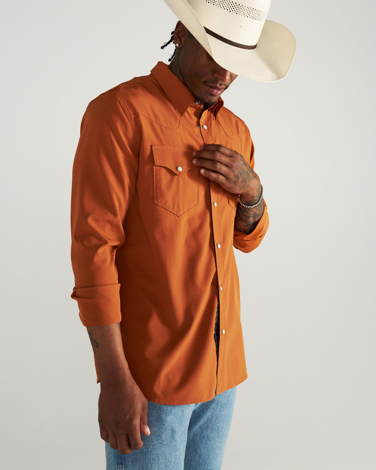 Closeup detail view of Men's Performance Western Pearl Snap - Burnt Orange