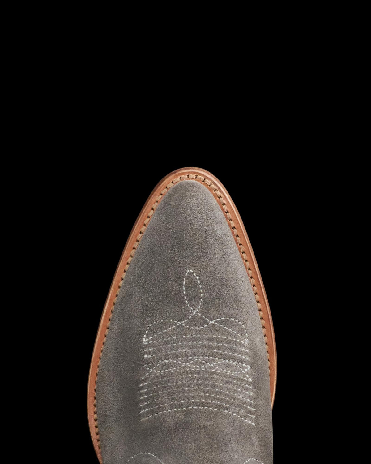 Toe view of The Abby Cavalier - Charcoal Suede on plain background