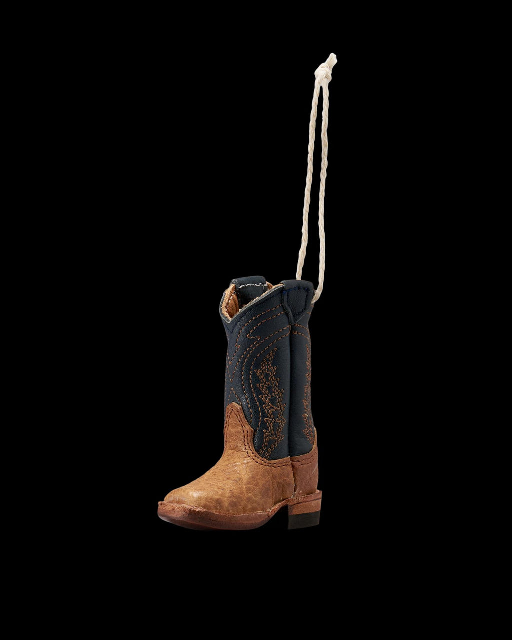 Quarterfront view of Doc Boot Ornament - Tan on plain background
