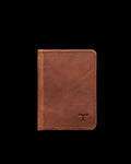 A brown leather wallet is standing upright against a plain white background. The wallet has visible stitching and a small embossed logo in the bottom right corner.