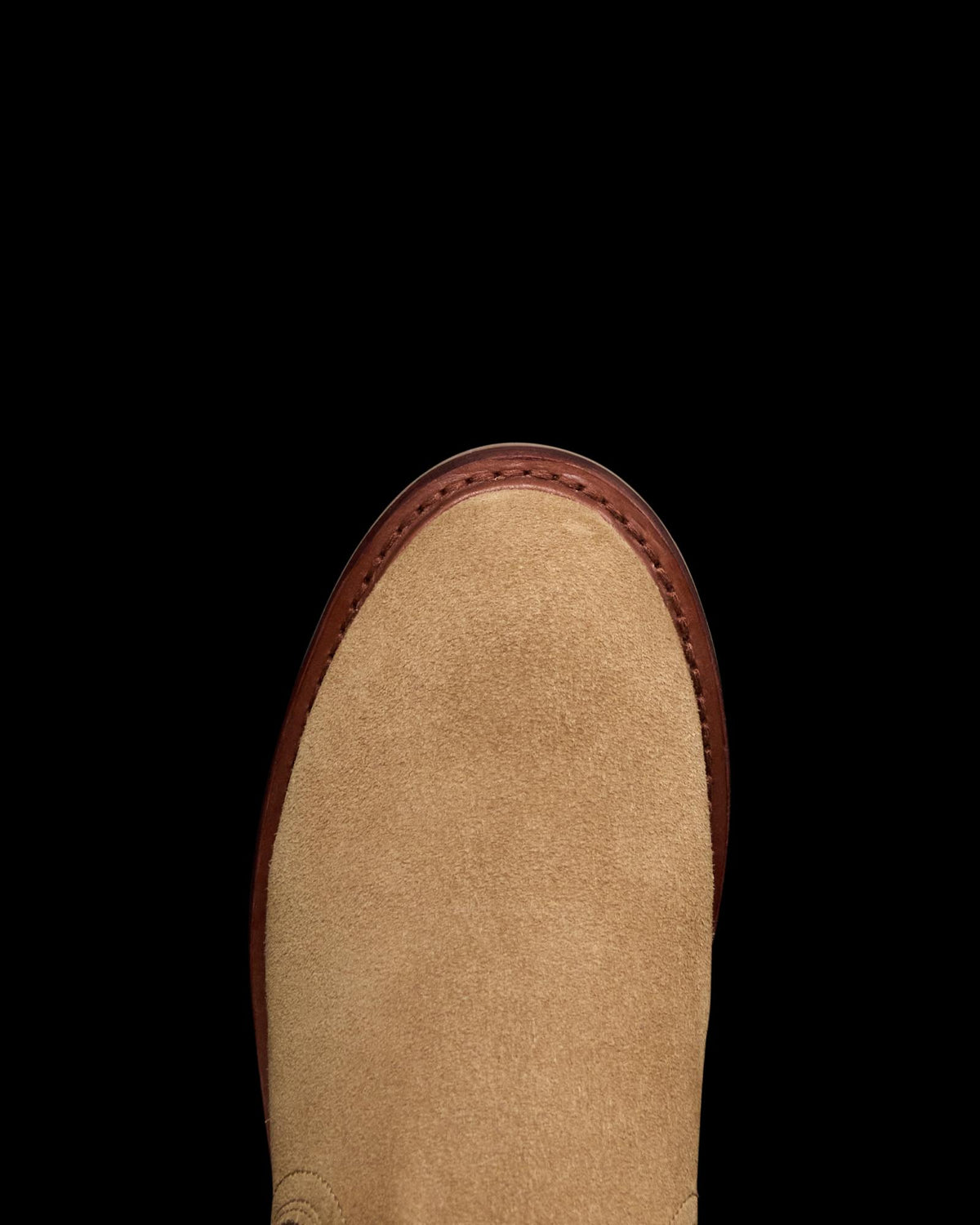 Toe view of The Rugged Chelsea - Sahara Suede on plain background
