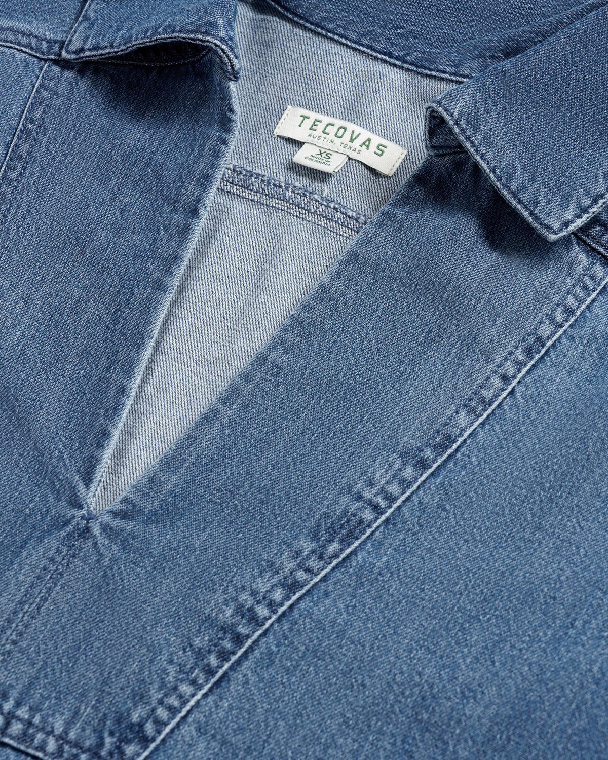 Closeup detail view of Women's L/S Denim Popover Top - Medium Wash