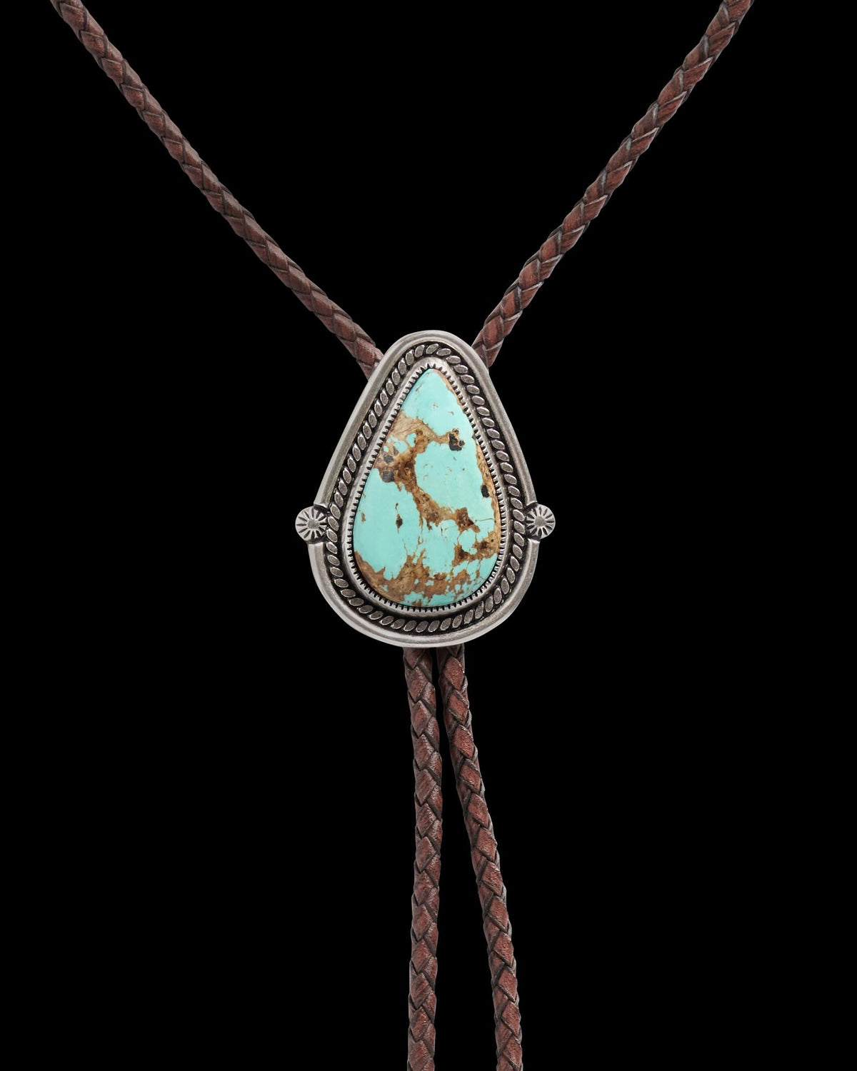 Closeup detail view of Iron Lamb Turquoise Drop Bolo - Turquoise/Brown