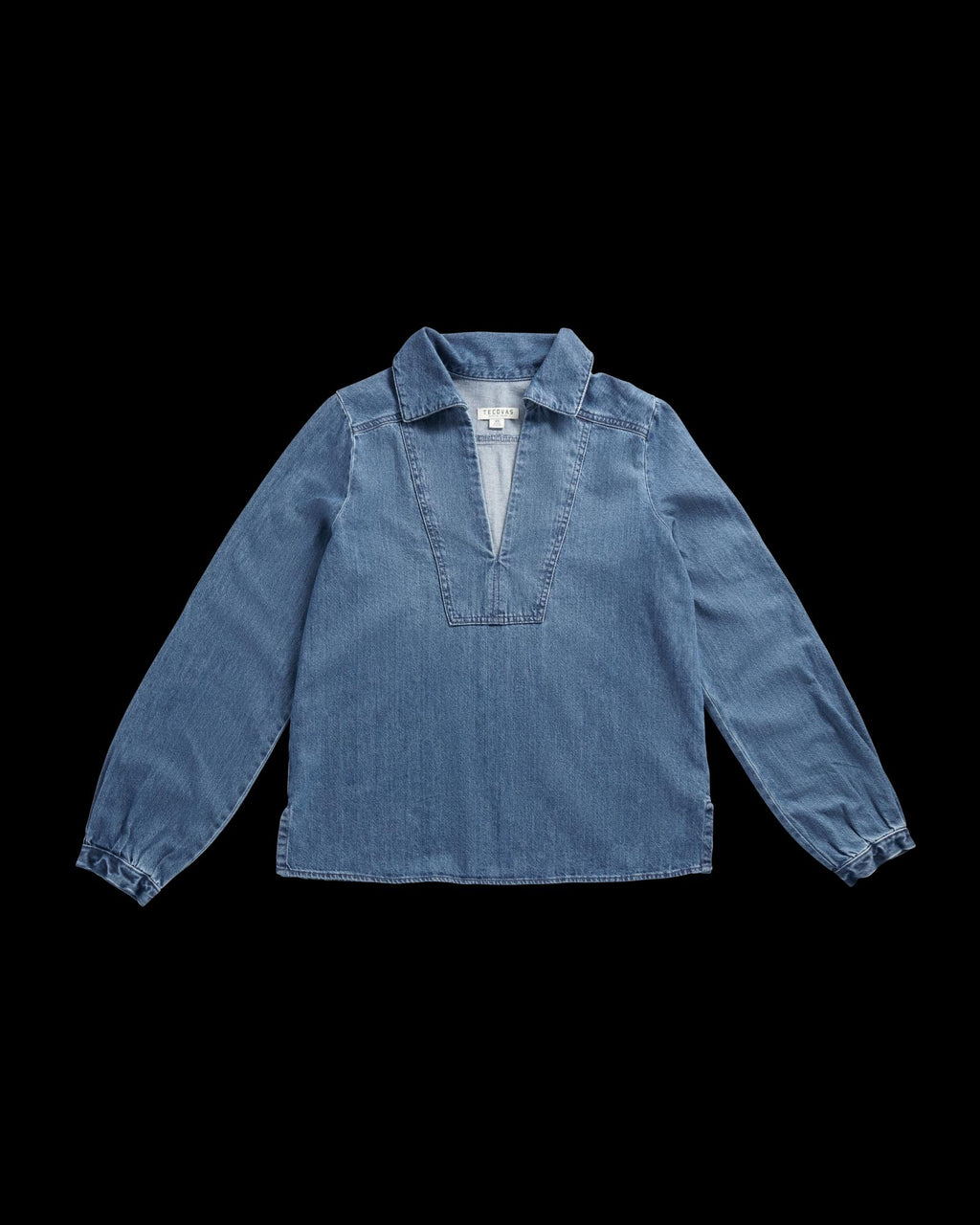 Front view of Women's L/S Denim Popover Top - Medium Wash on plain background