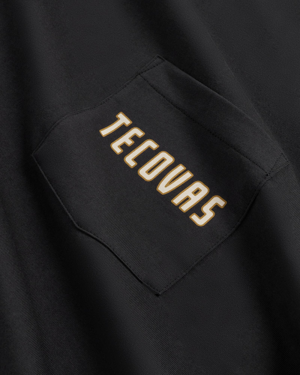 Closeup detail view of Men's the Finest Pocket T-Shirt - Black/Multi