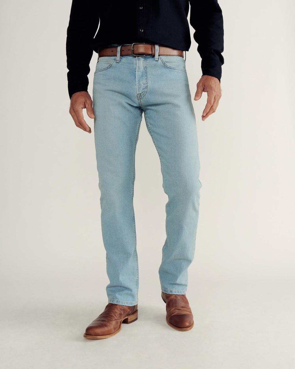 Front view of Men's Slim Straight Stretch Denim - Light Stone Wash on model