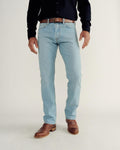 Front view of Men's Slim Straight Stretch Denim - Light Stone Wash on model