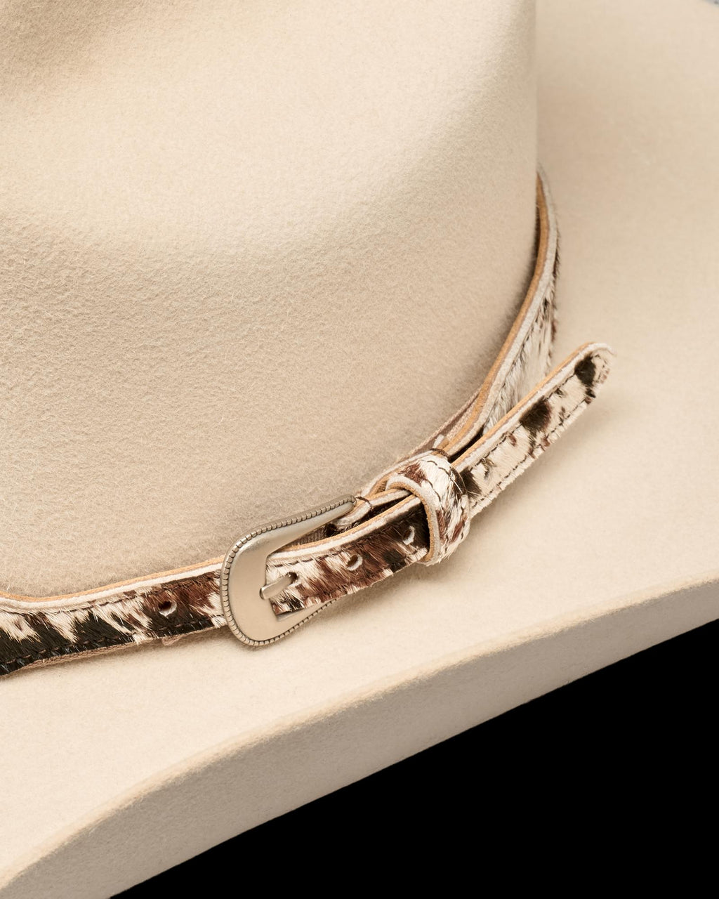 Closeup view of Hair on Hide Buckle Hat Band - Brown Multi