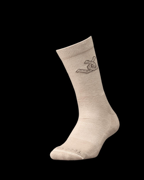 Beige sock displayed upright with a small bird graphic on the outer calf area, shown on a plain white background.
