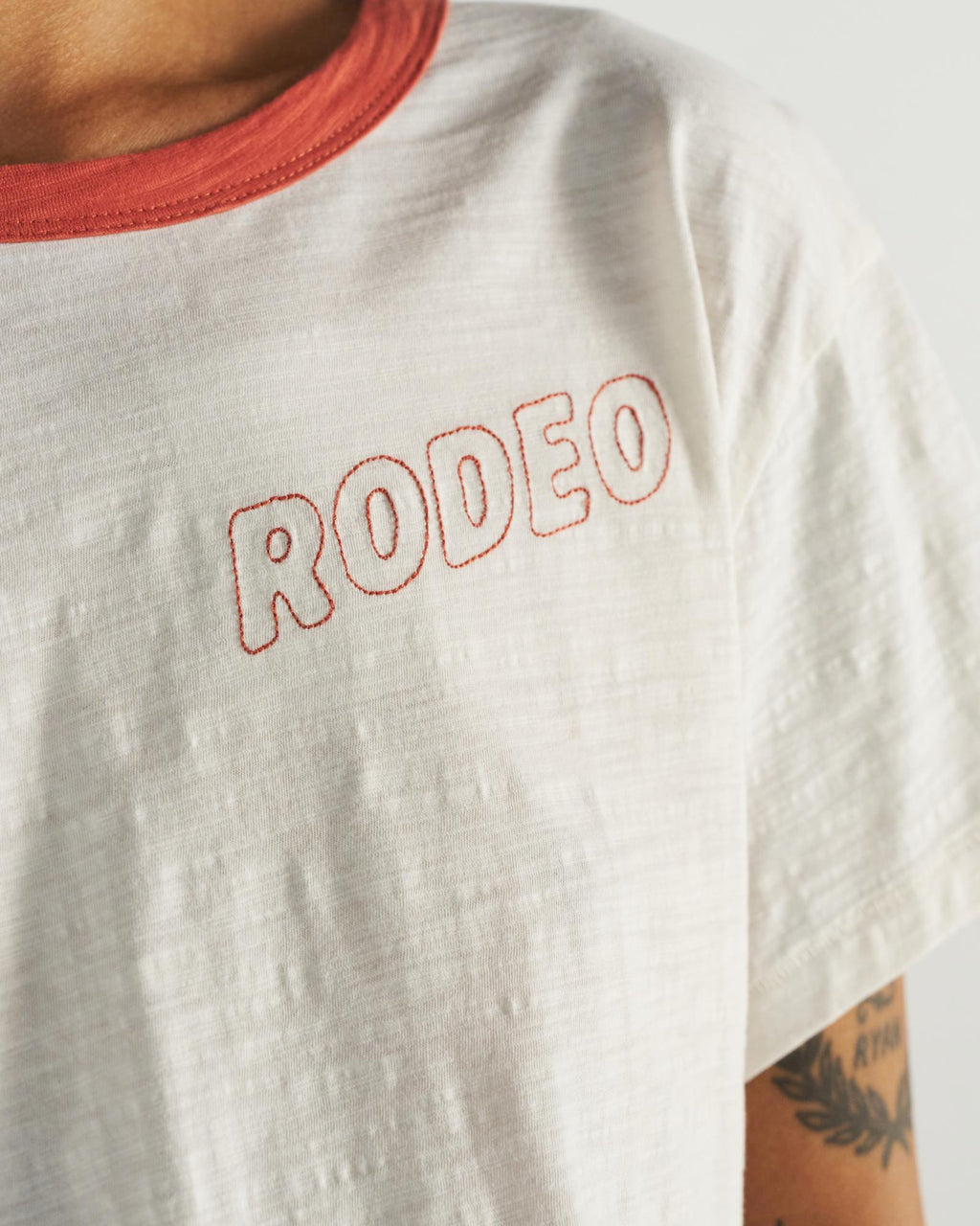 Closeup detail view of Women's Vintage Ringer Tee - Bone/Ginger Spice