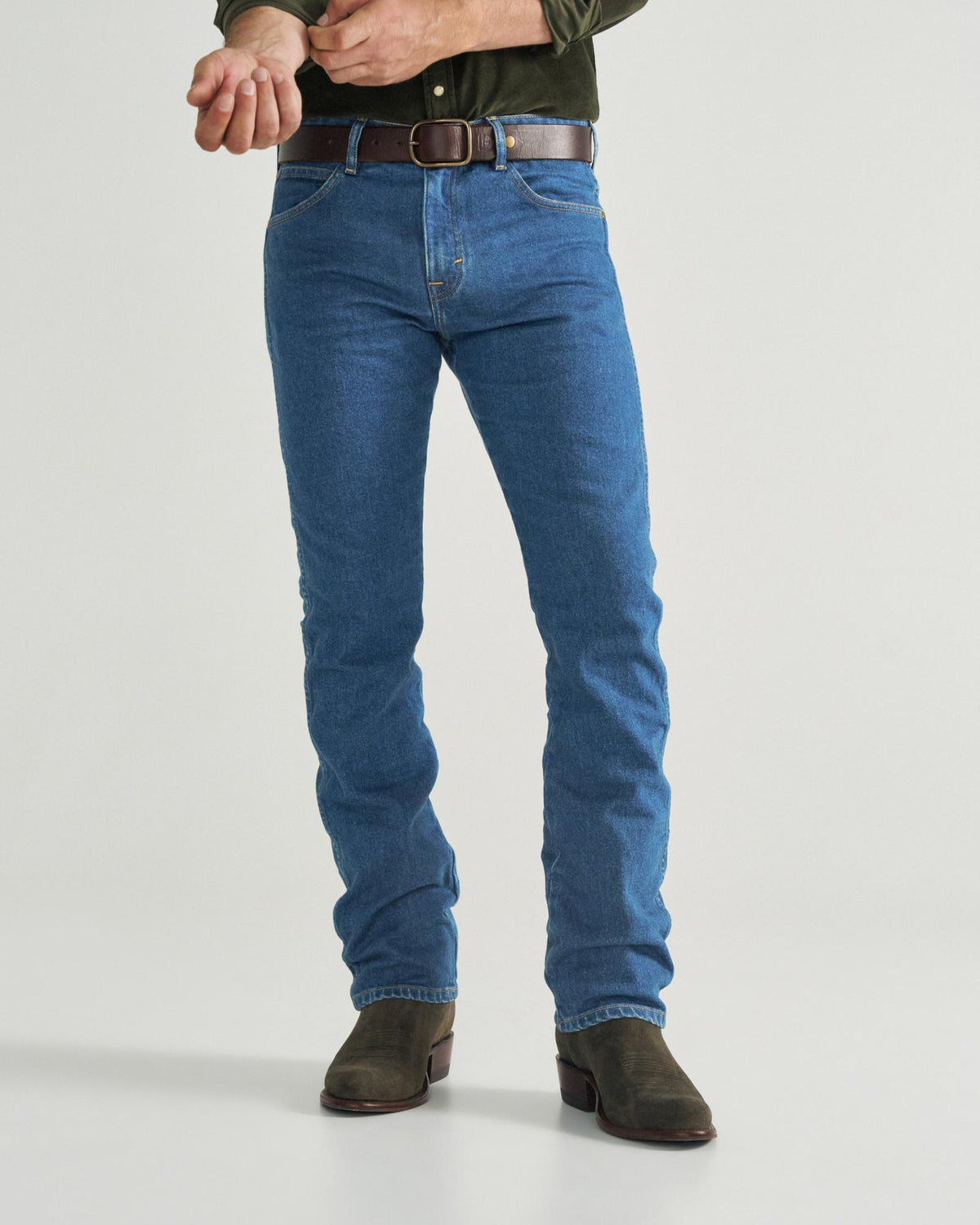Front view of Men's Slim Straight Heritage Denim - Medium Blue on model