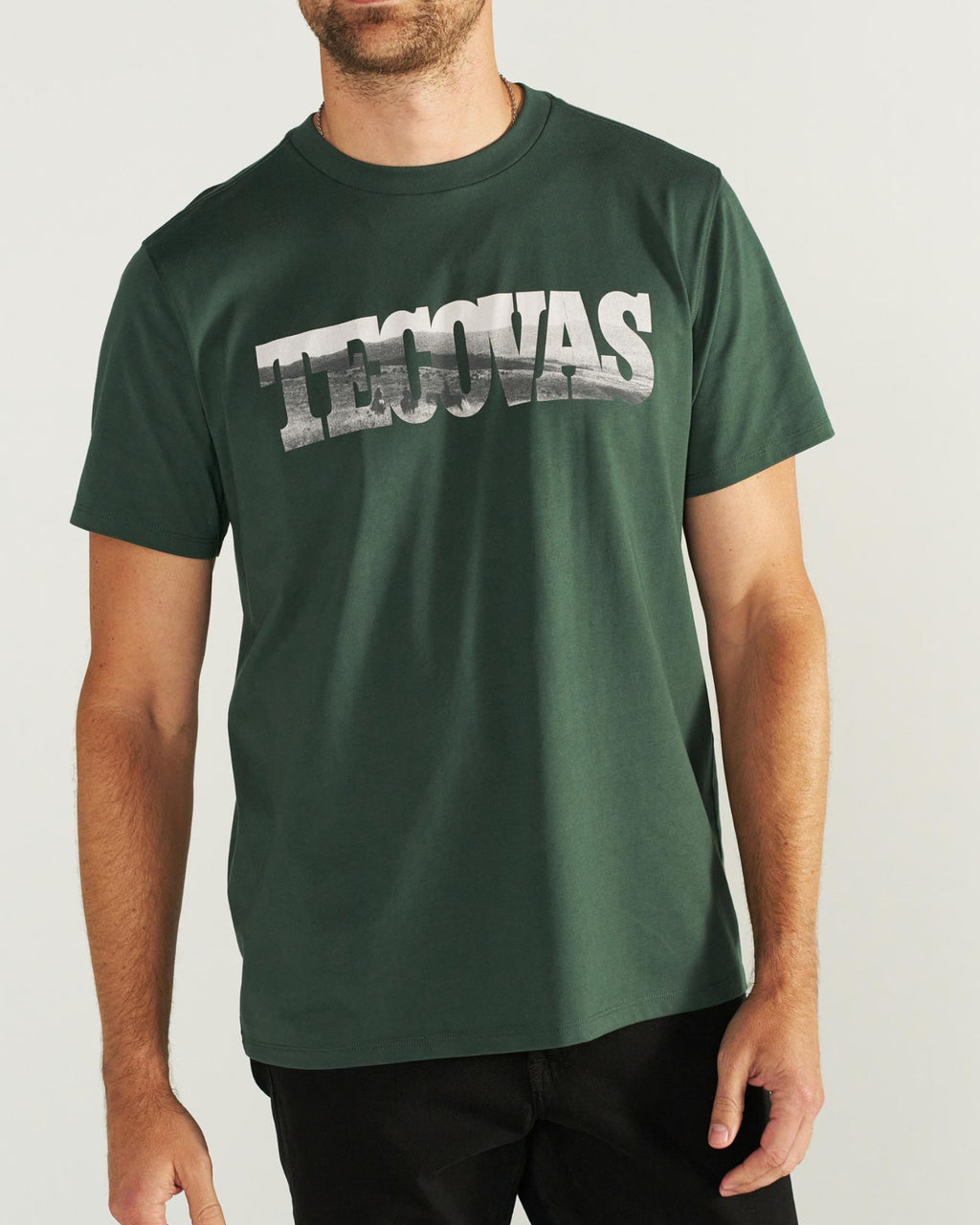 Front view of Men's Letter Fill T-Shirt - Hunter Green on model