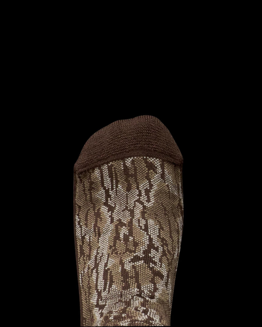 A close-up of the toe section of a brown and tan camouflage-patterned sock on a white background.