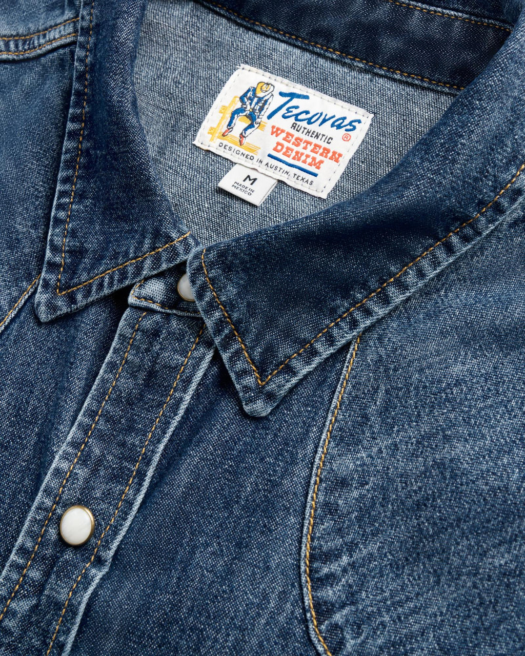 Closeup detail view of Men's Denim Short Sleeve Pearl Snap - Dark Wash