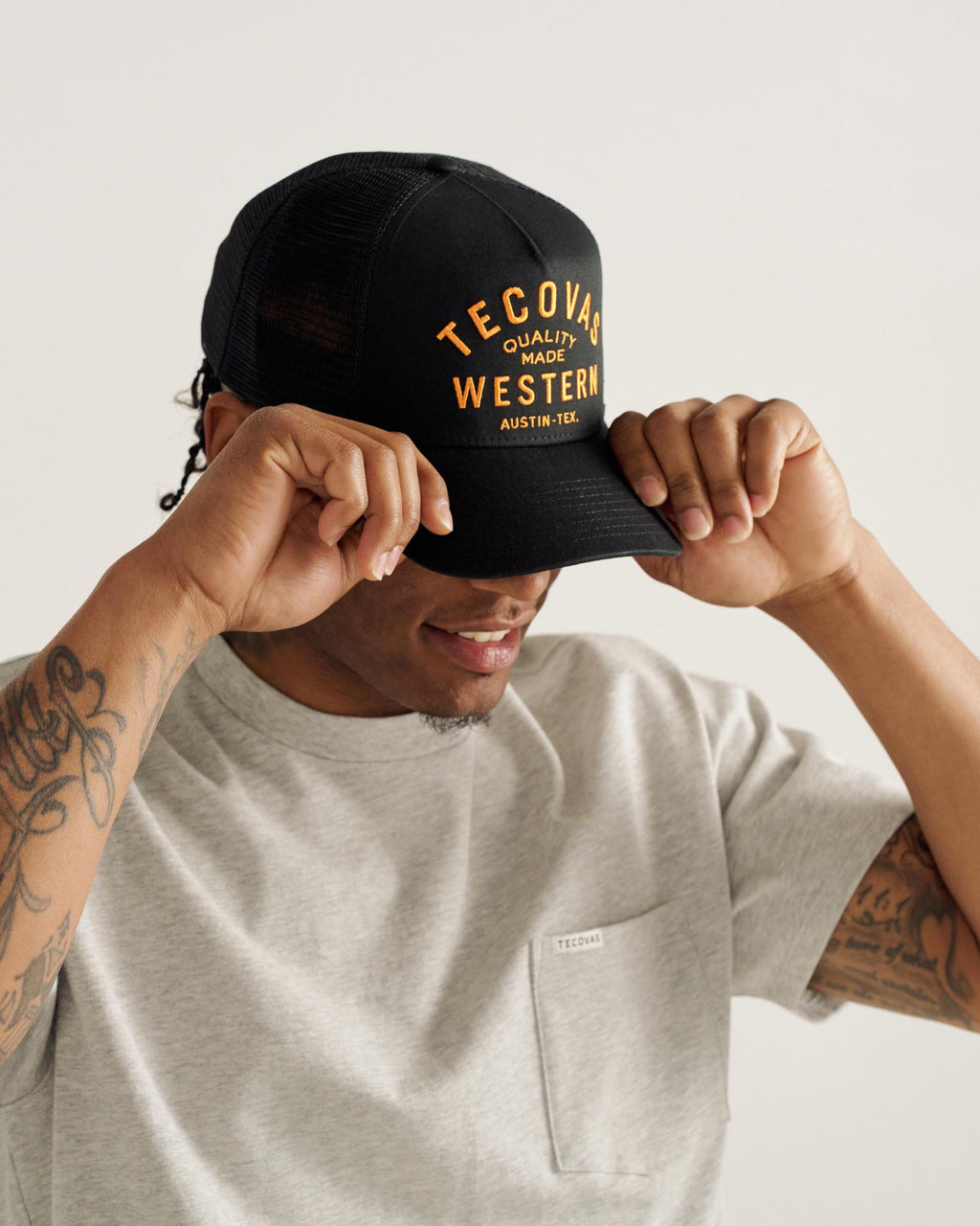 View of Quality Made Trucker Hat - Black/Orange