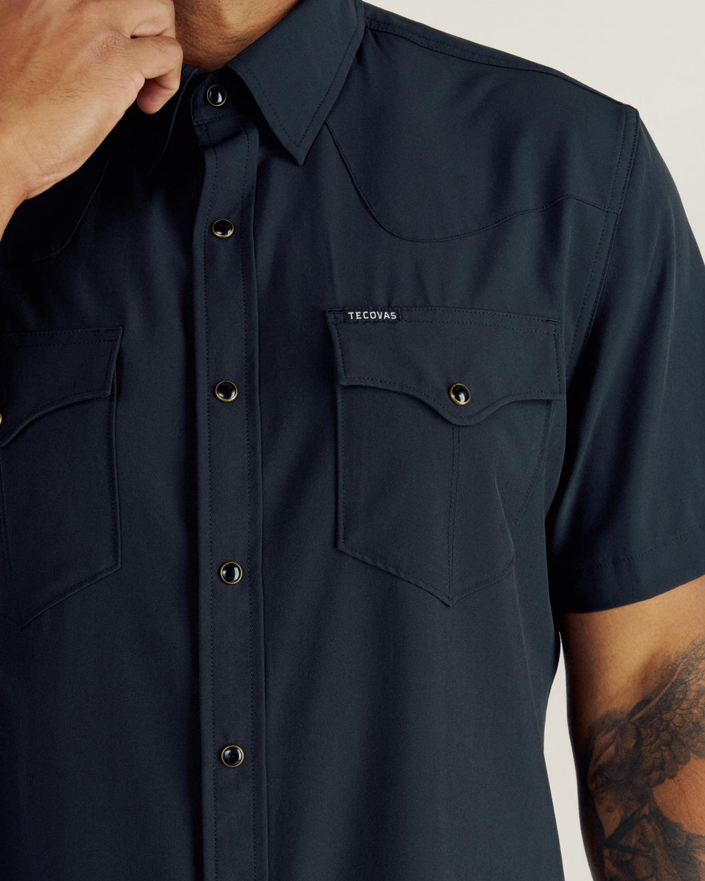 Closeup detail view of Men's Performance Western Pearl Snap SS - Black