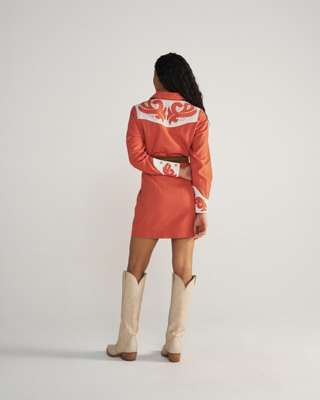 Closeup detail view of Women's L/S Applique Mini Dress - Ginger Spice / Cloud