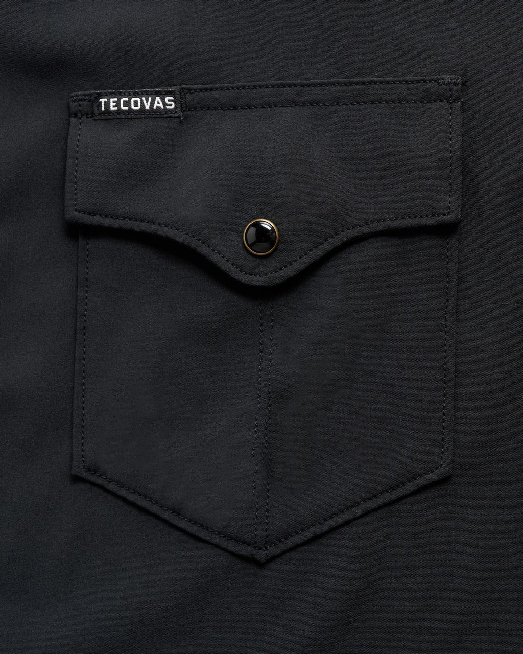 Closeup detail view of Men's Performance Western Pearl Snap SS - Black