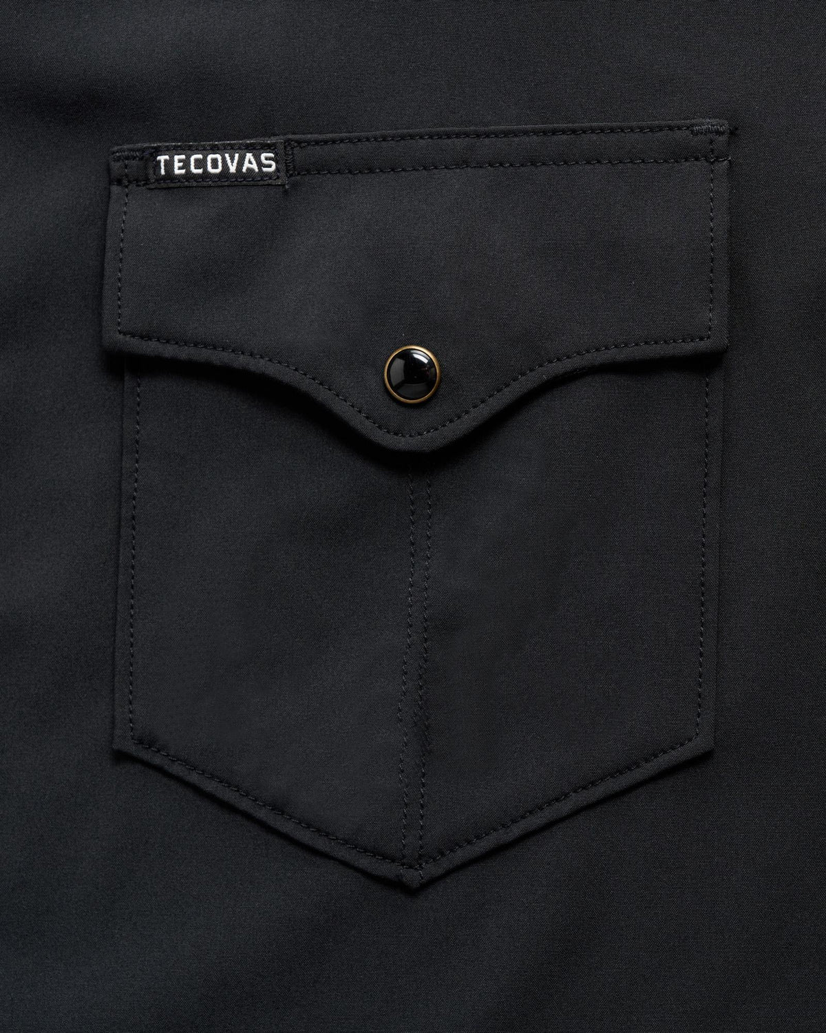 Closeup detail view of Men's Performance Western Pearl Snap SS - Black