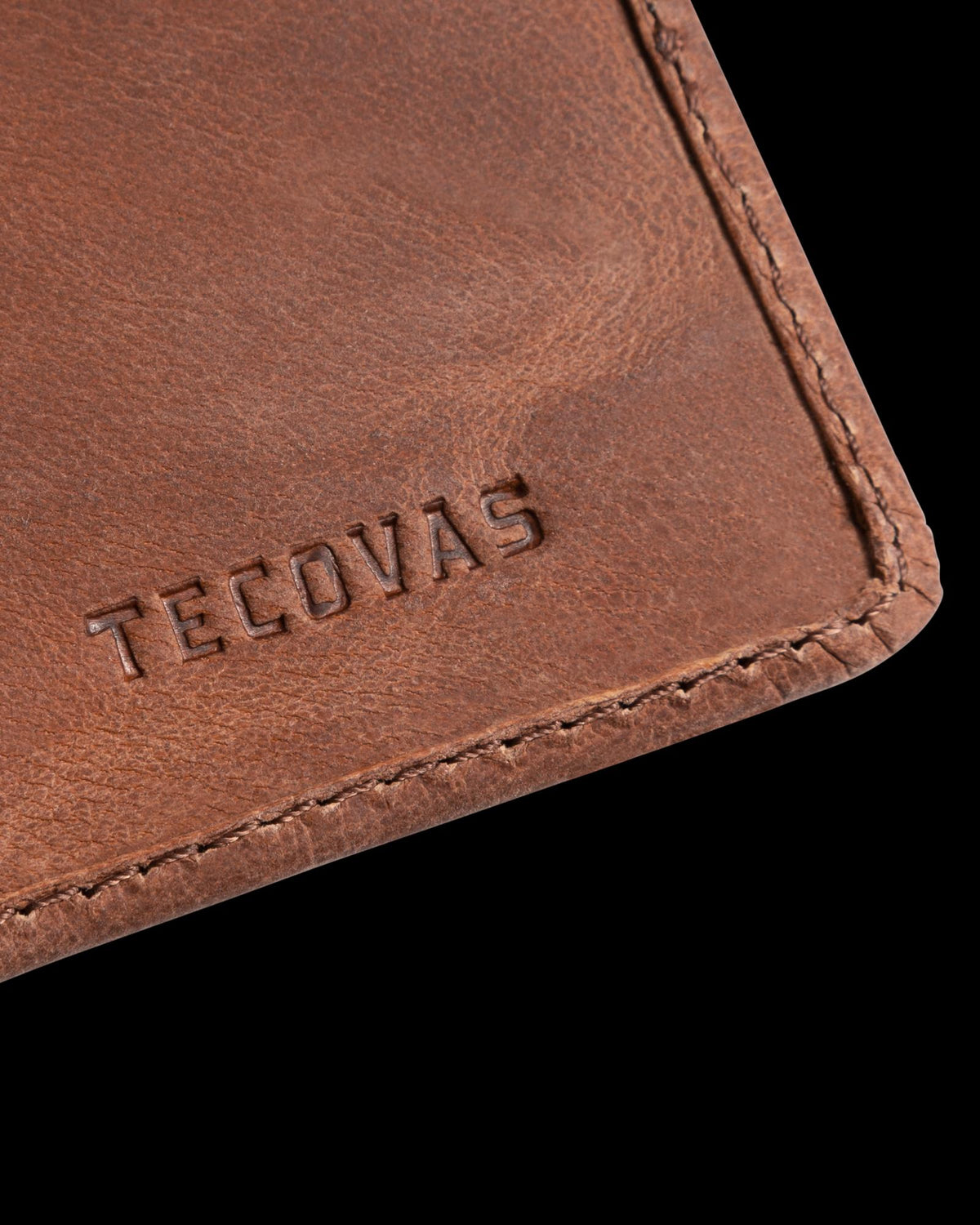 Closeup view of Goat Bifold Card Case - Scotch